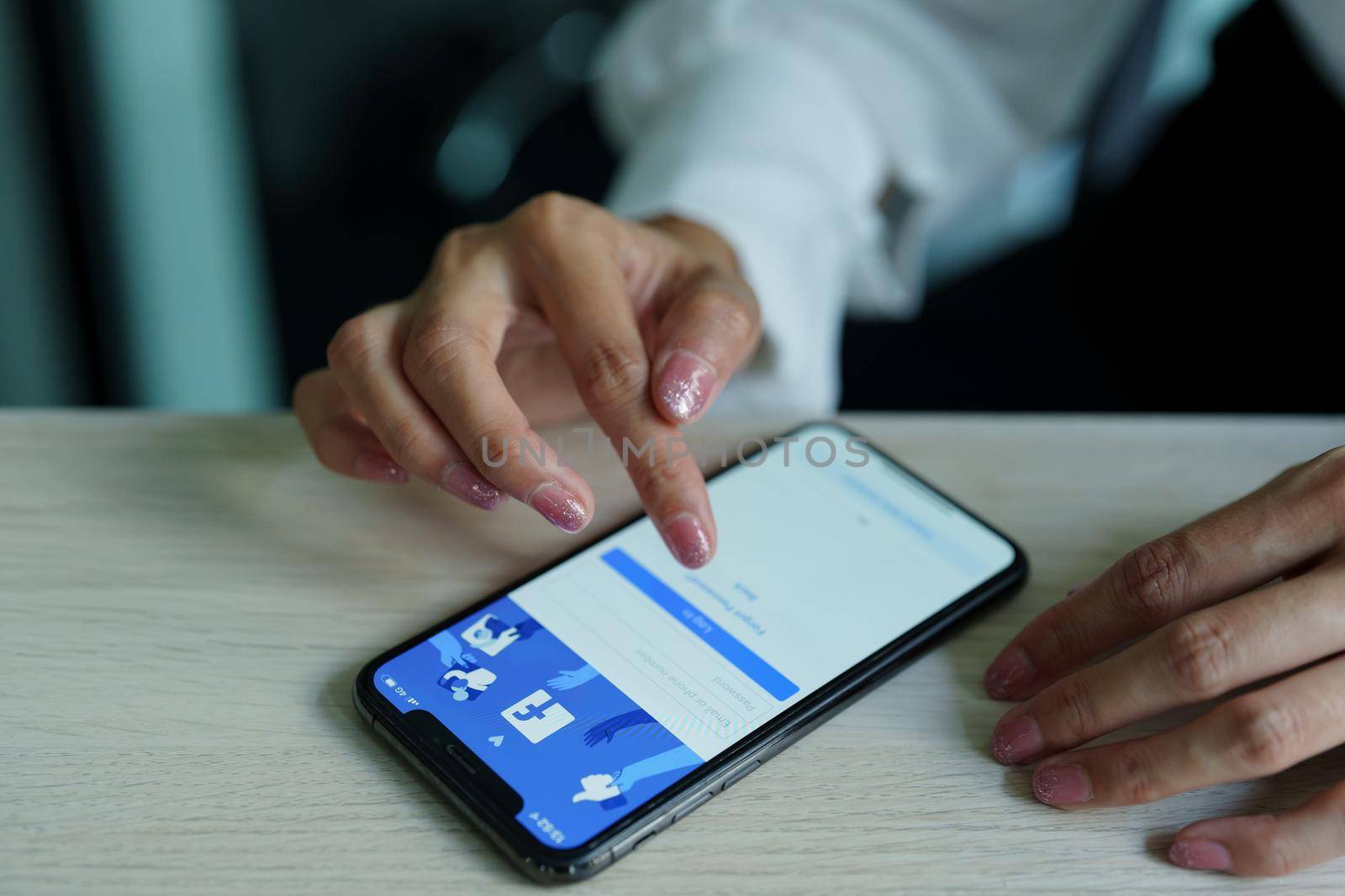 Chiang Mai Thailand. Sep 08, 2022. Woman holds smart phone with facebook application on the screen. facebook is a photo-sharing app for smartphones