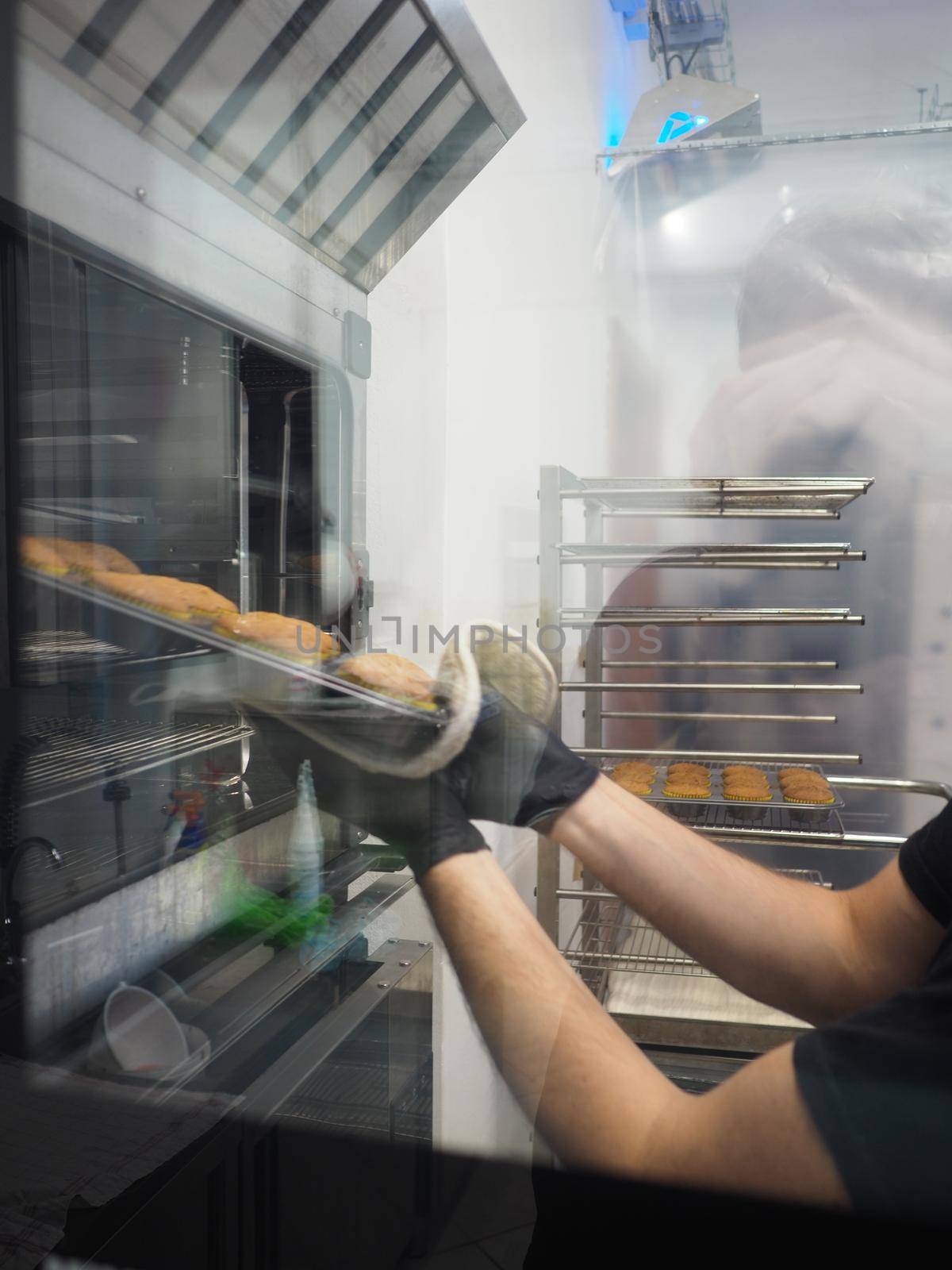 baker baking cooking in the kitchen of a lab