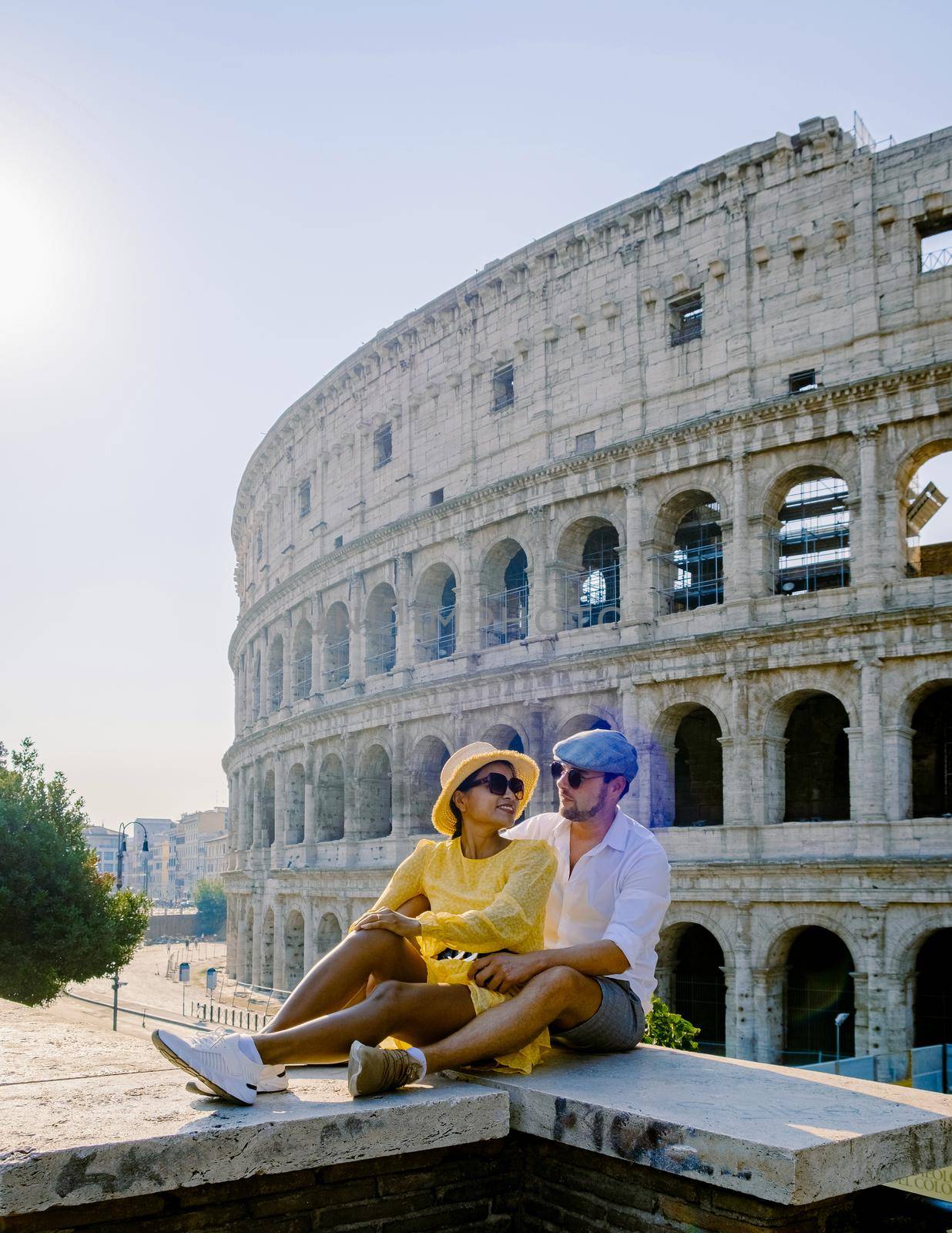 young couple mid age Asian woman and a European man on a city trip to Rome Italy Europe,
