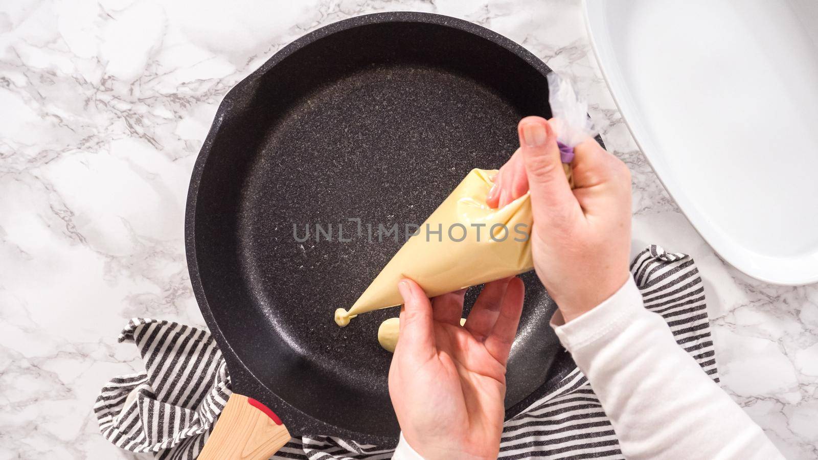 Flat lay. Step by step. Frying mini pancake cereal in a nonstick frying pan.