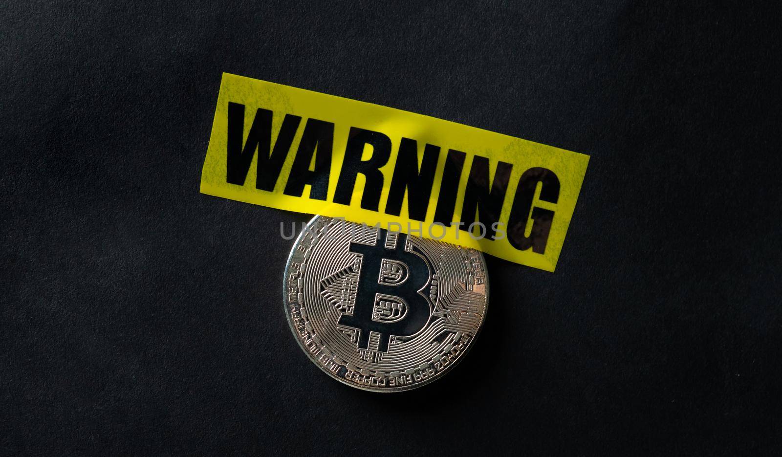 Bitcoin with warning tape by GekaSkr