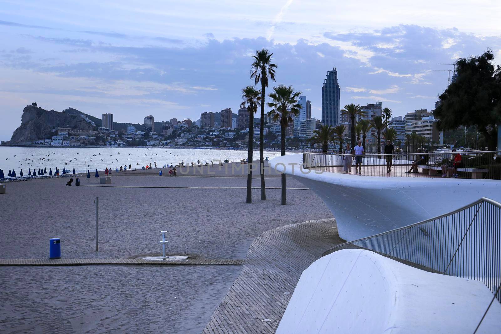 Benidorm, Alicante, Spain- September 11, 2022: Poniente beach with its beautiful promenade with access to the beach and viewpoint with modern design