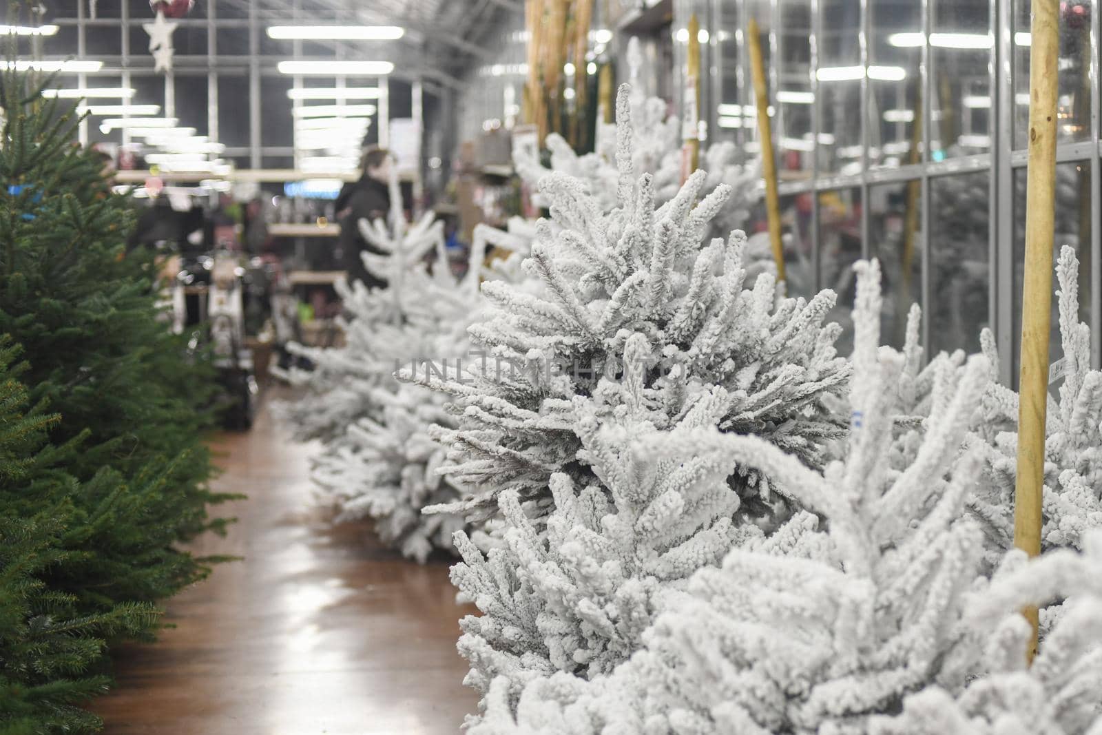 White christmas artificial trees for sale on a shop