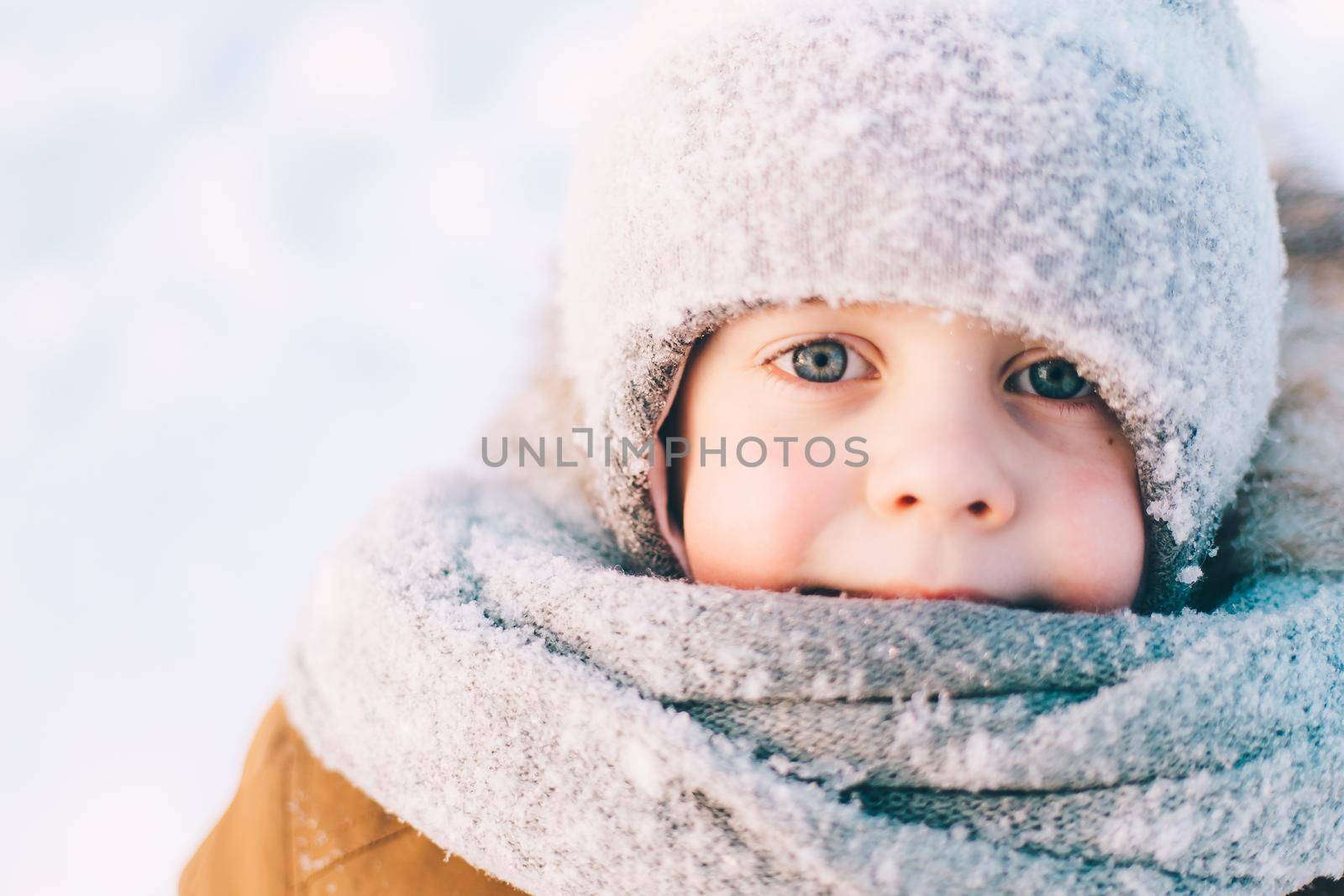 Winter portrait of a boy lifestyle . Winter. An article about children walking in the cold. Winter Games. by alenka2194
