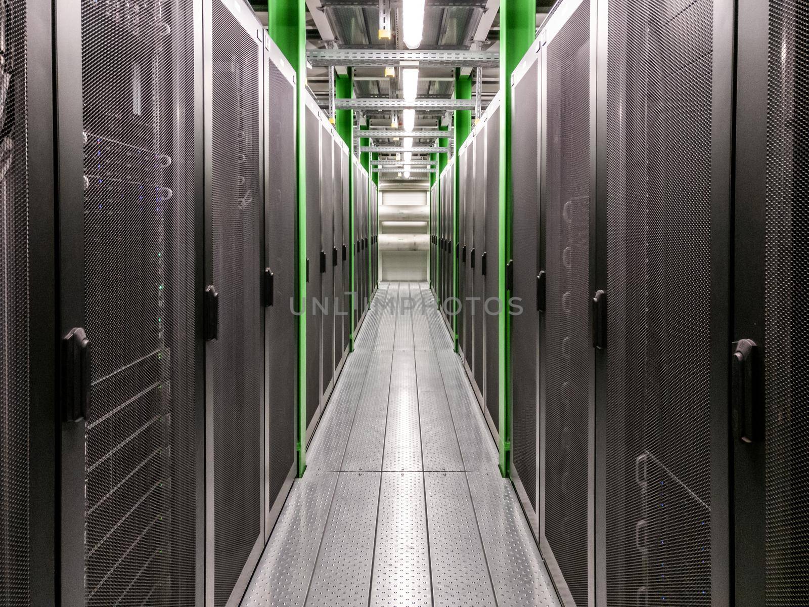 Corridor in server room data center by bildgigant