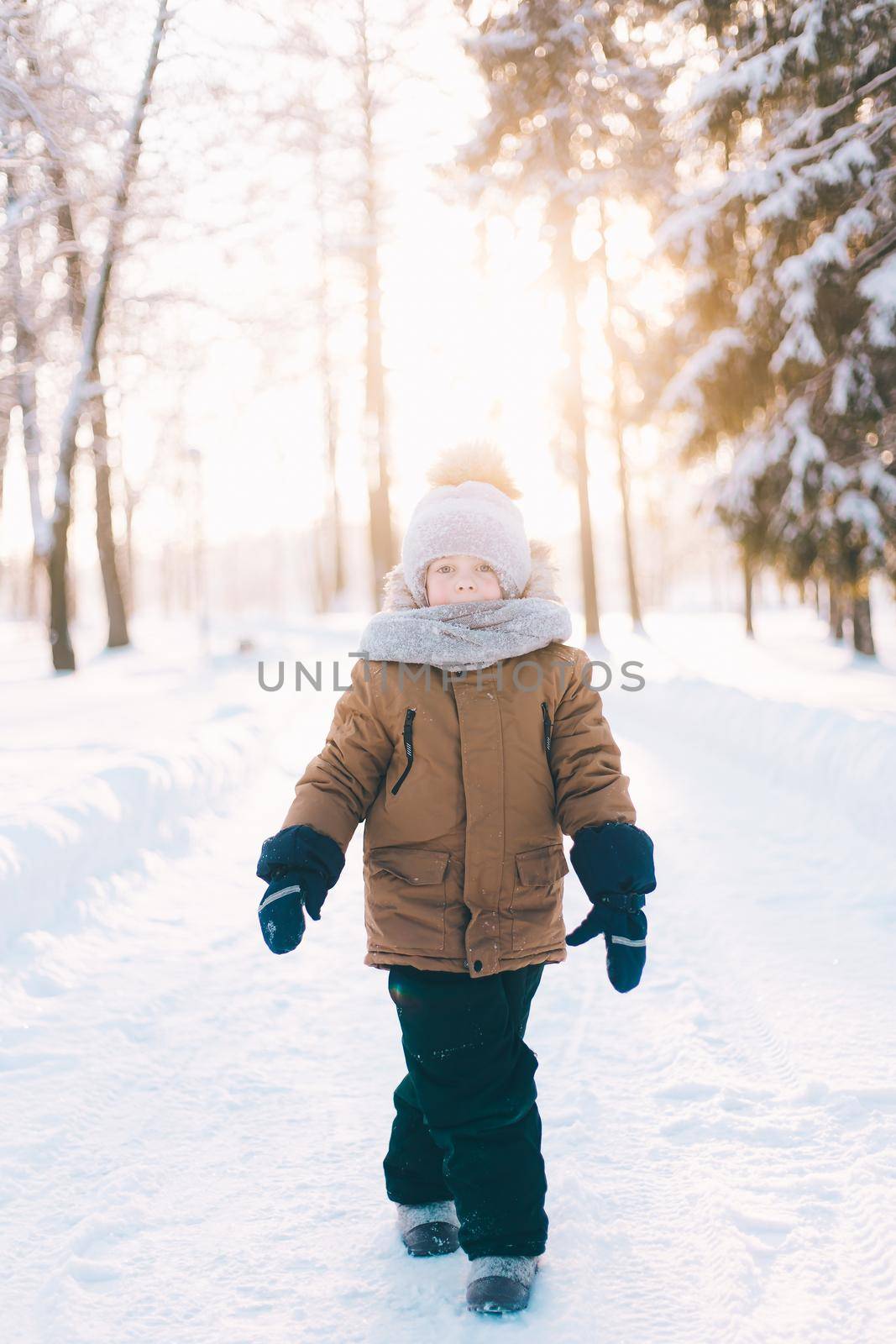 Winter portrait of a boy lifestyle . Winter. An article about children walking in the cold. Winter Games. Winter walks