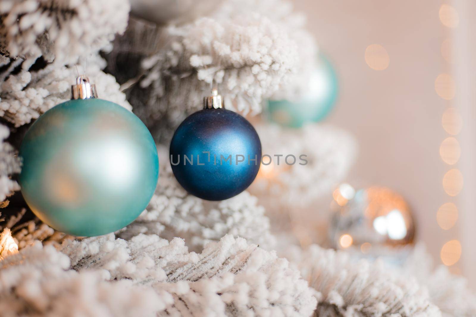Balloons on the Christmas tree . New Year and Christmas. Festive decoration. Garland.