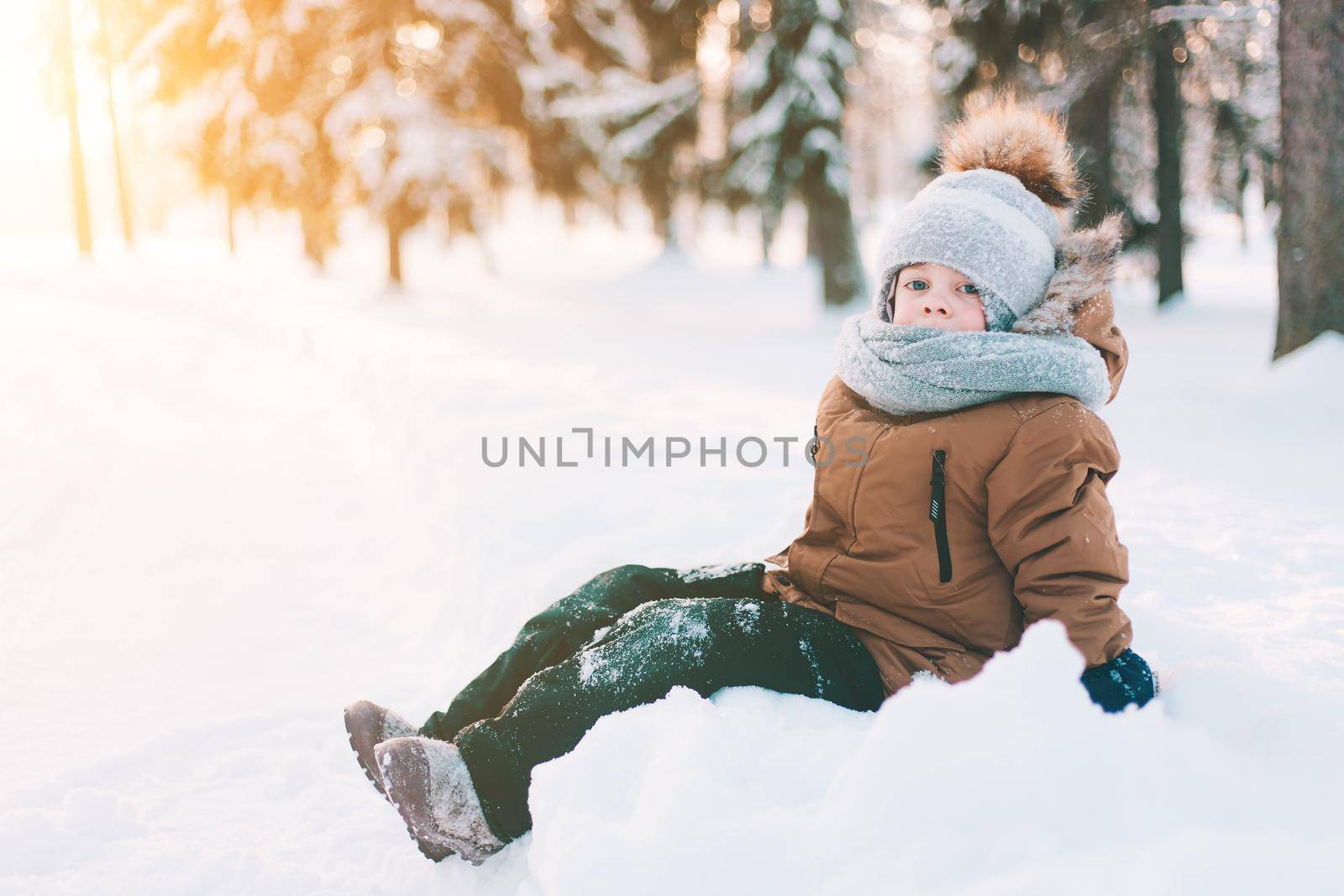 Winter portrait of a boy lifestyle . Winter. An article about children walking in the cold. Winter Games. Winter walks