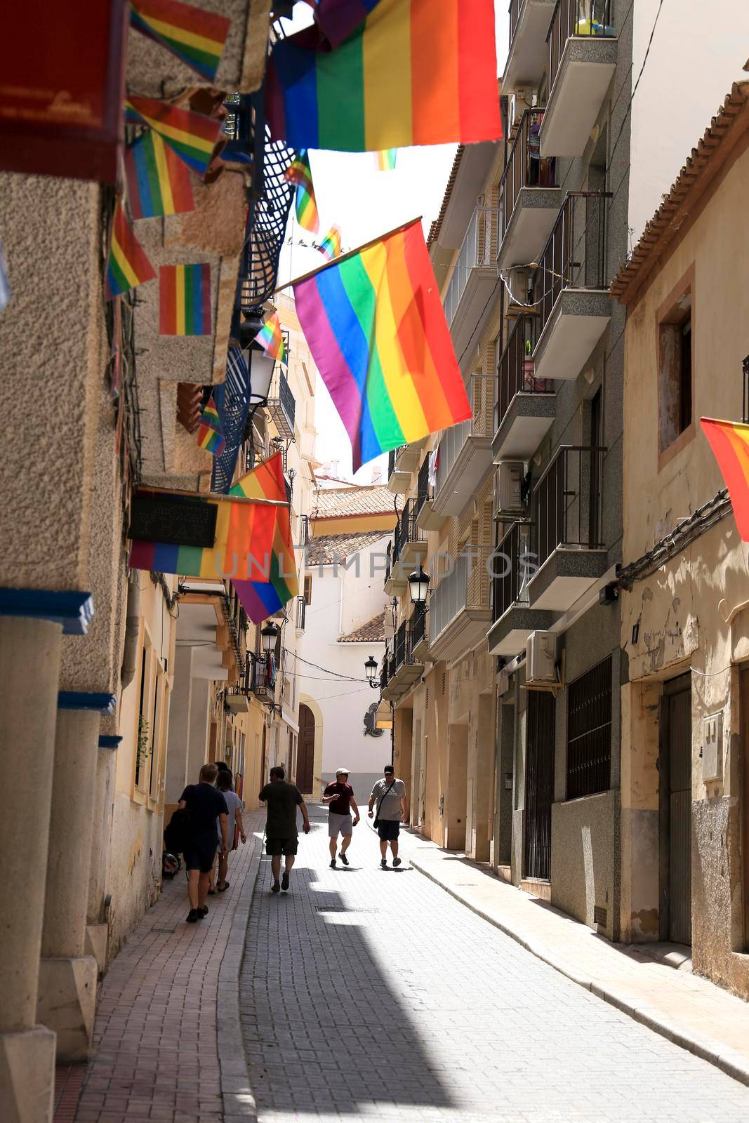 Streets and facades adorned with rainbow flags in Benidorm by soniabonet