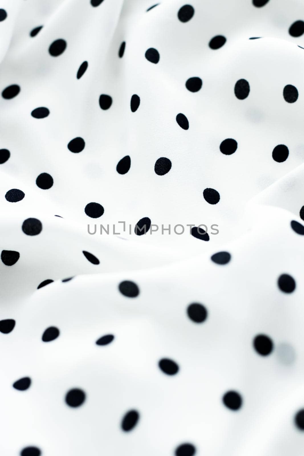 Fashion design, interior decor and vintage material concept - Classic polka dot textile background texture, black dots on white luxury fabric design pattern