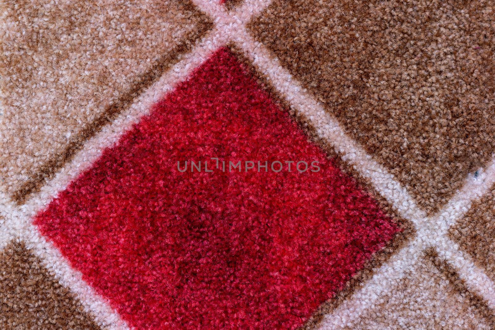 Geometric design carpet texture background closeup view by Bilalphotos