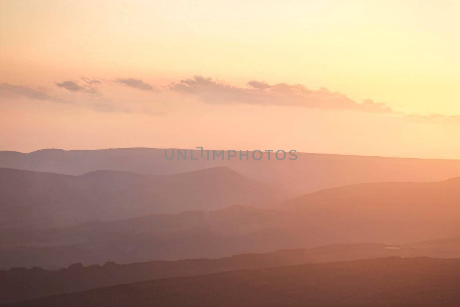 landscape in sunshine pink sunrise over the mountains by Iryna_Melnyk