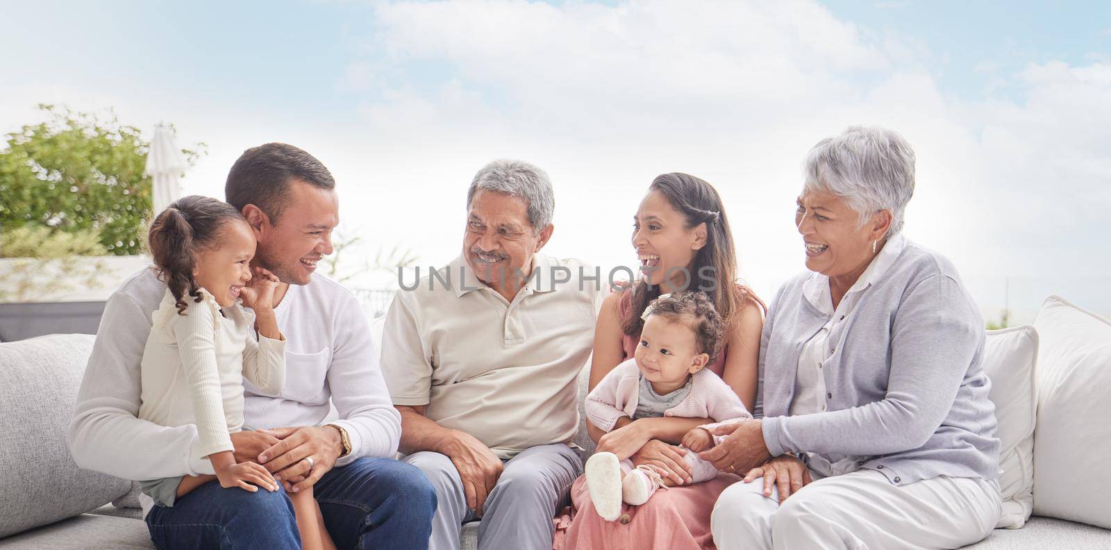 Happy family with children and grandparents talking, communication and conversation on couch outdoor in family home. Big family of elderly retirement people, love and young kids smile together.