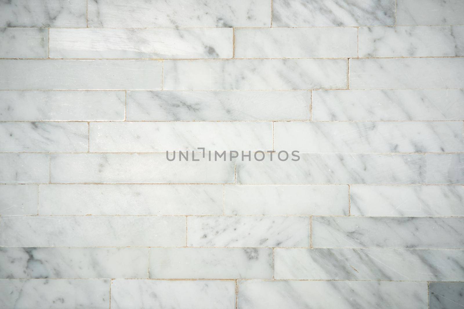 Pattern square shape of tile surface on white marble decorative wall. by sirawit99