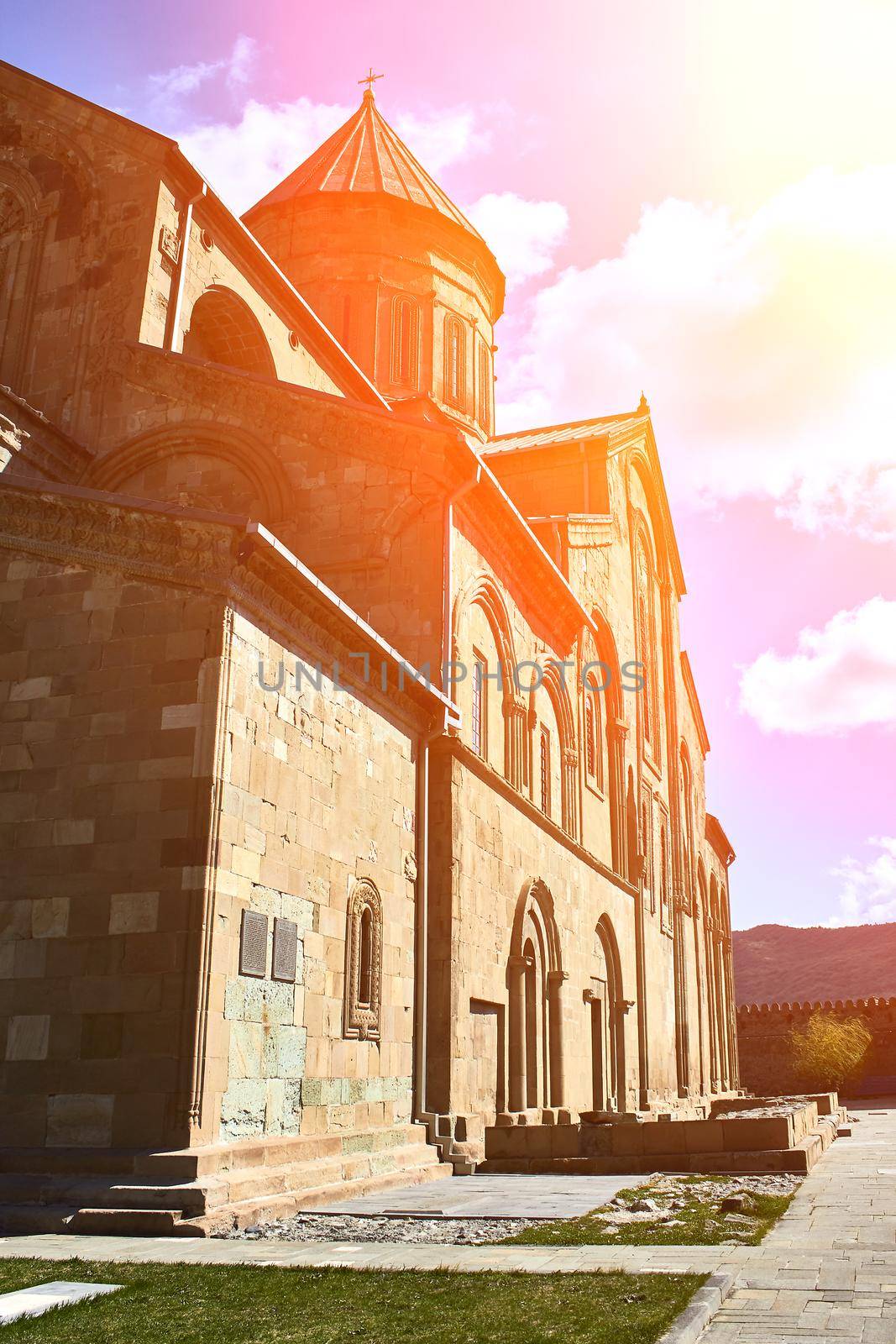 Narikala Castle in Tbilisi, Georgia. Sun flare by nazarovsergey