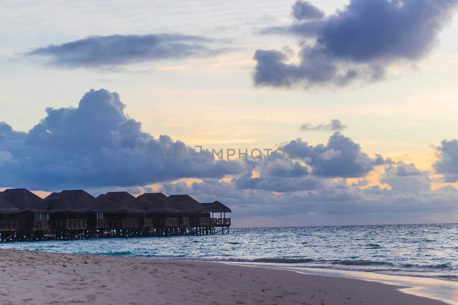 Shot of a over water bungalows on tropical island