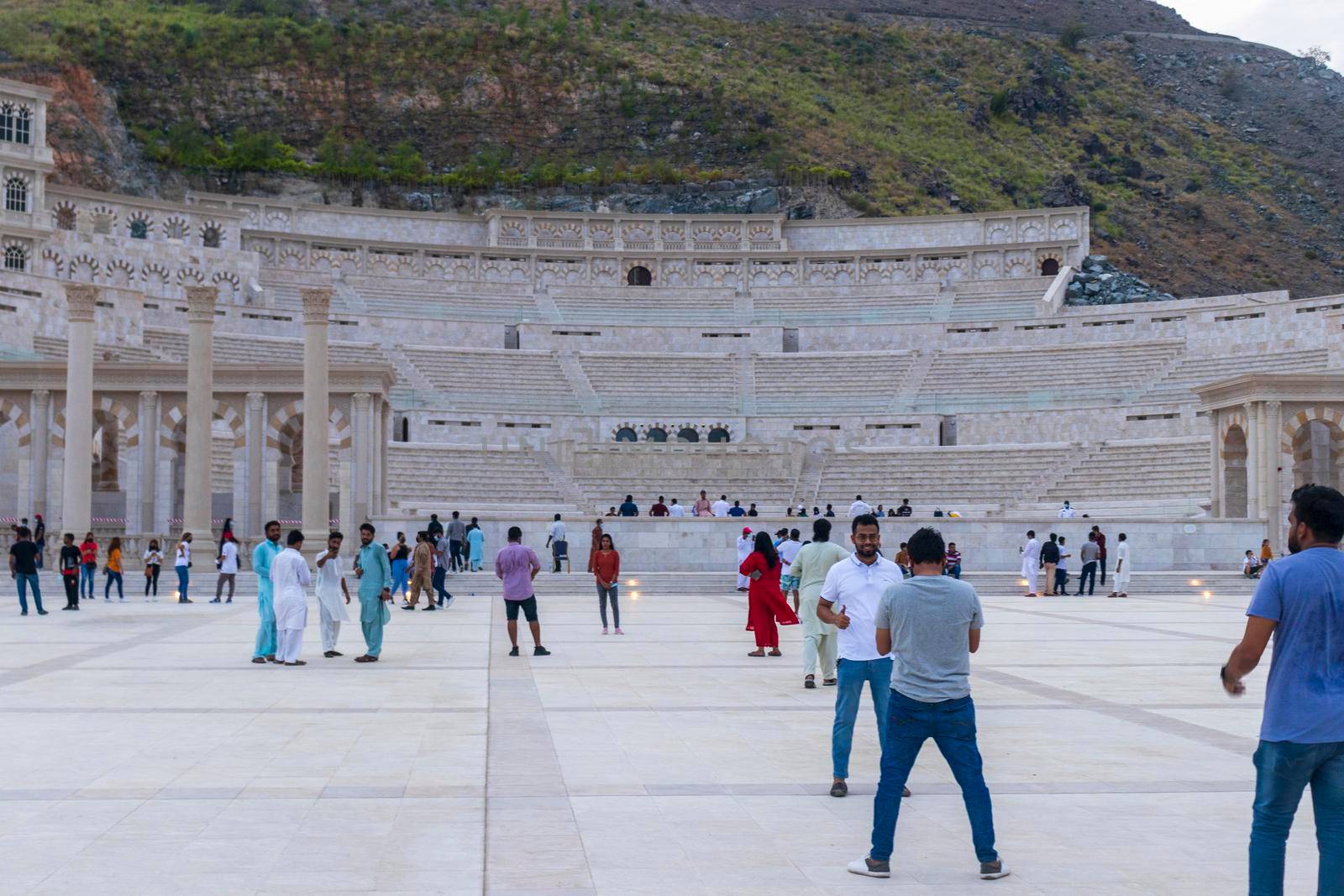 Sharjah, UAE - 07.20.2021 - Visitors at Sharjah amphitheatre, Khor Fakkan area. Sightseeing by pazemin