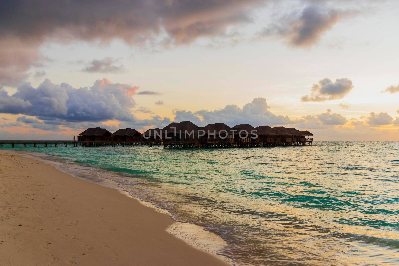 Shot of a over water bungalows on tropical island