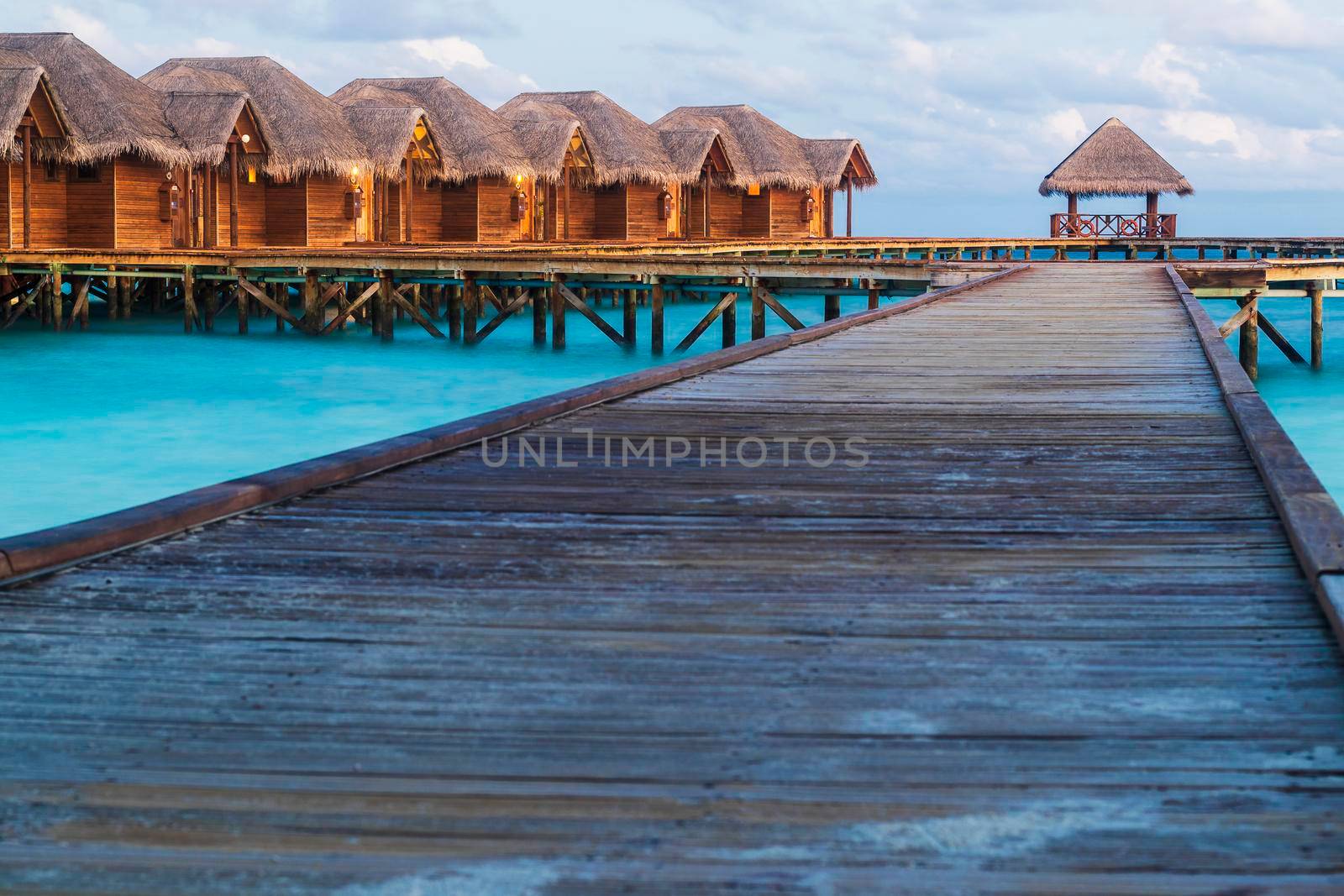 Shot of a over water bungalows on tropical island