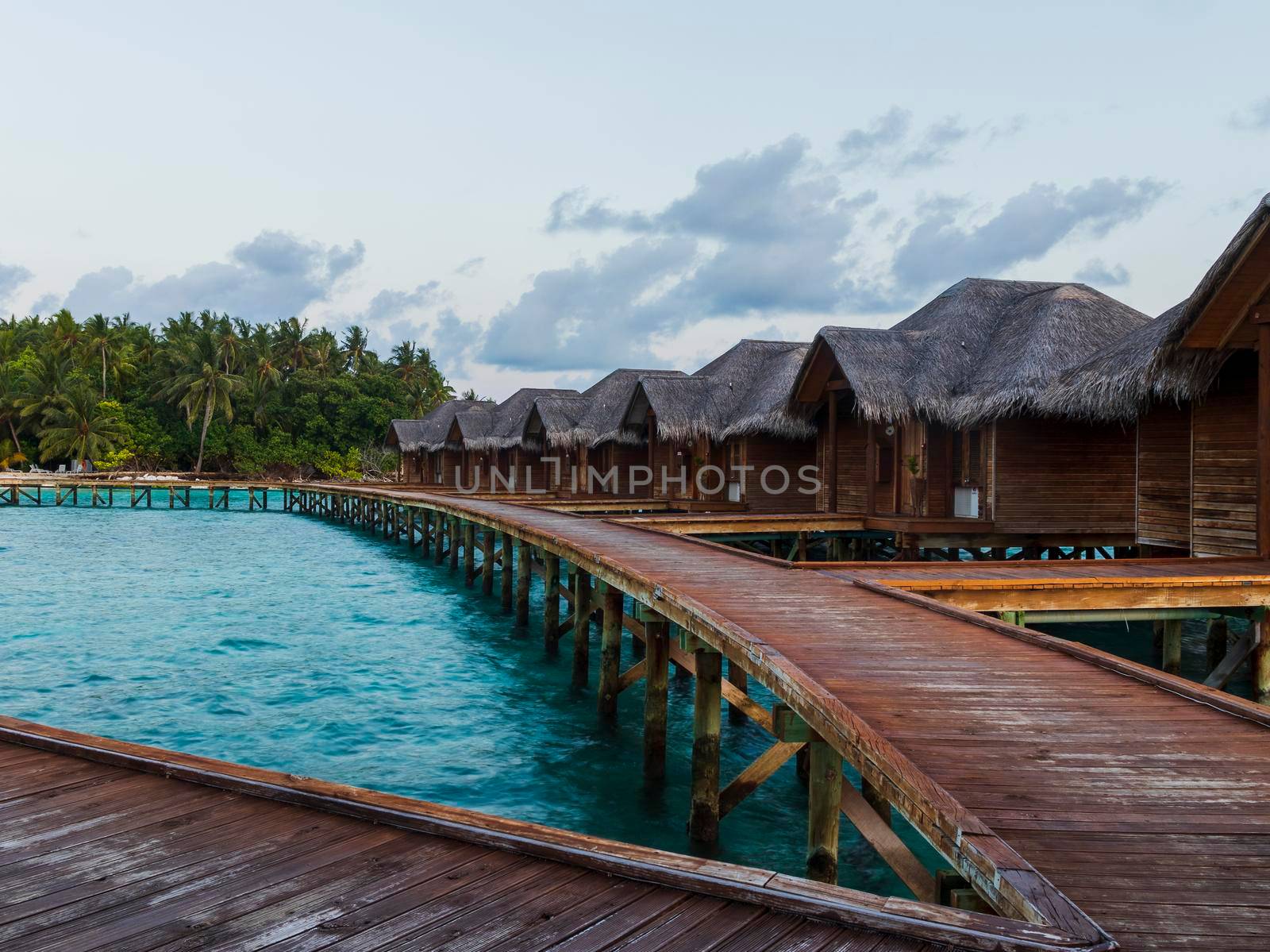 Shot of a over water bungalows on tropical island