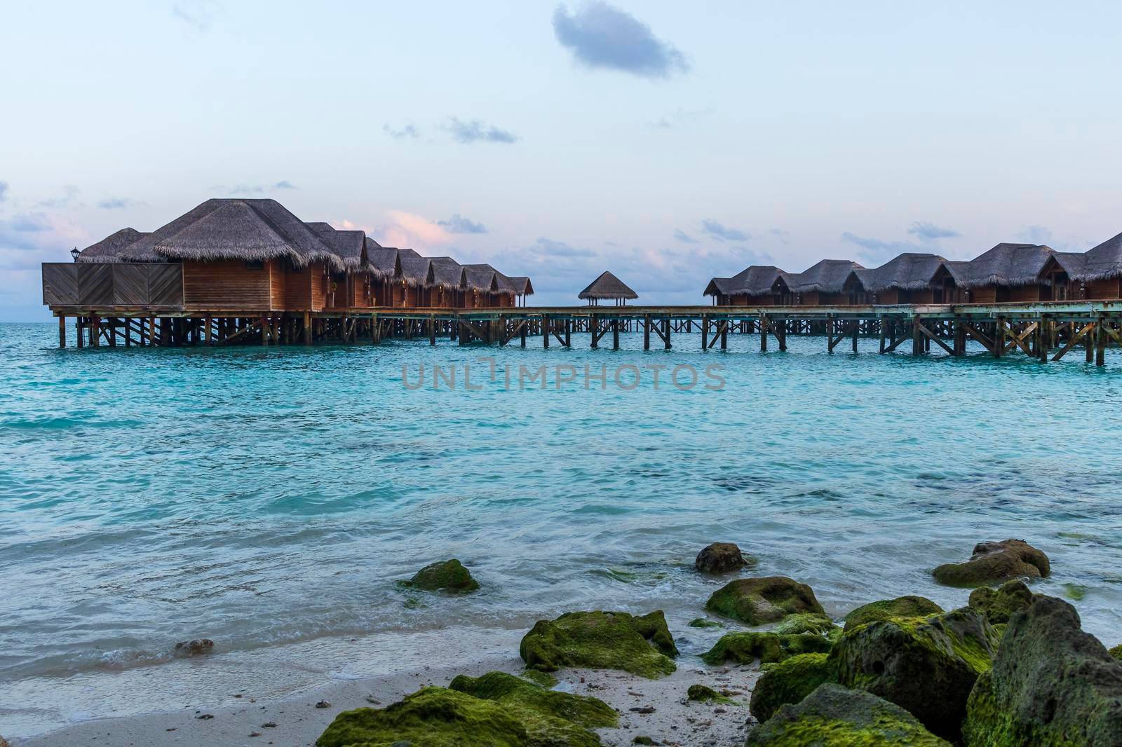 Shot of a over water bungalows on tropical island