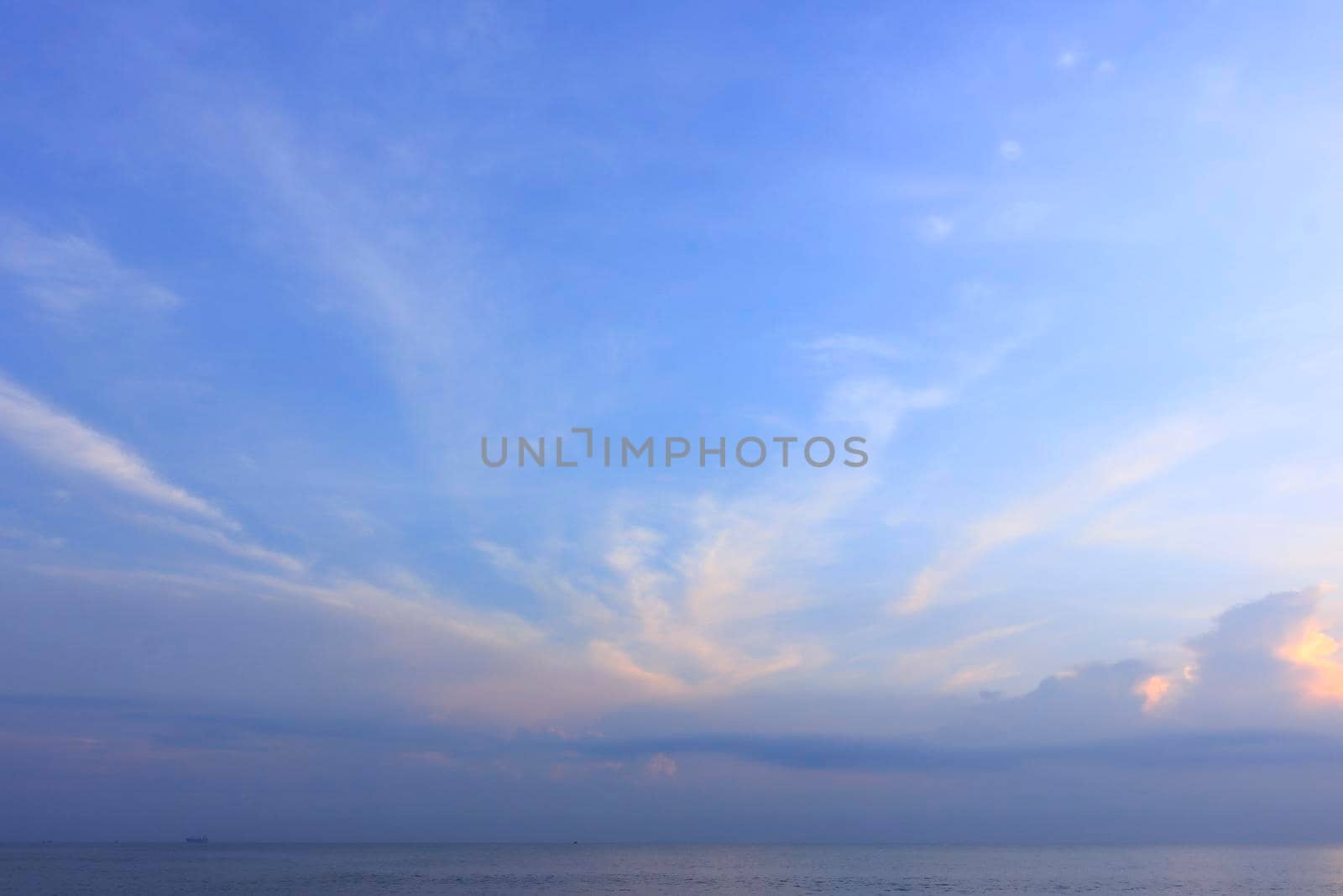 photograph of the sunrise from the sea and the beautiful sky and morning clouds