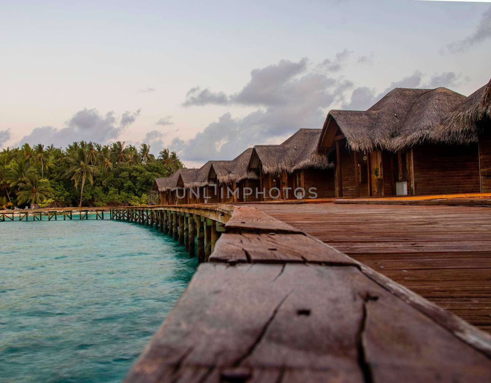 Shot of a over water bungalows on tropical island. Holiday by pazemin
