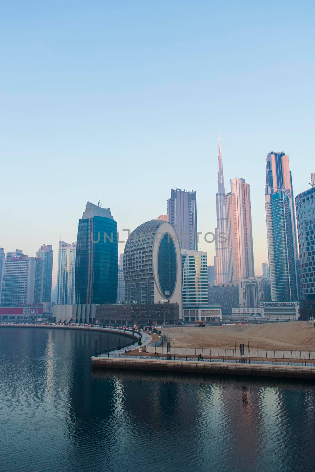 Dubai, UAE - 01.15.2021 Sunrise over a Dubai water canal. Outdoors by pazemin