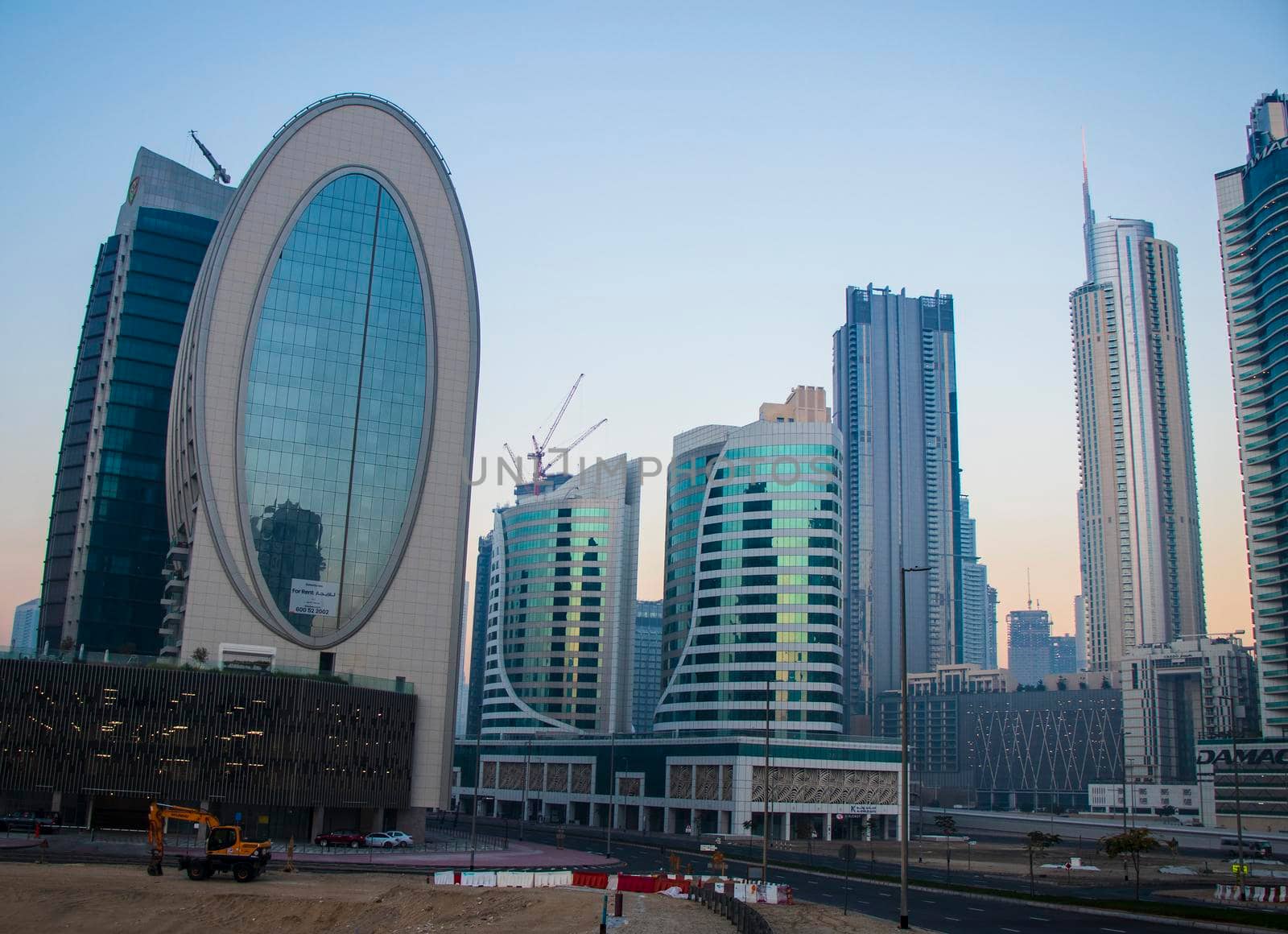 Dubai, UAE - 01.15.2021 Morning hour in Business bay district , Marasi drive. Burj Khalifa, tallest building in the world can be seen in the scene. Outdoors by pazemin