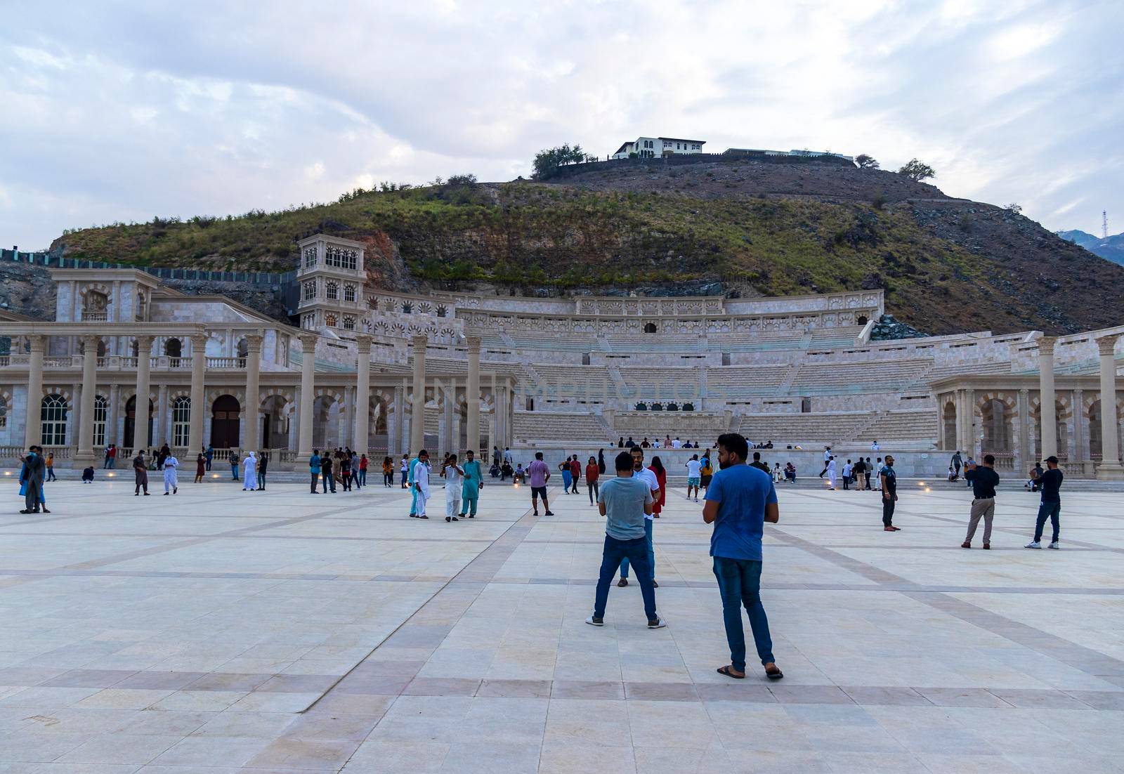 Sharjah, UAE - 07.20.2021 - Visitors at Sharjah amphitheatre, Khor Fakkan area. Sightseeing by pazemin