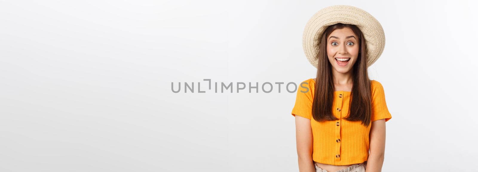 Travel concept - Close up Portrait young beautiful attractive girl wtih trendy hat and smiling. White Background. Copy space