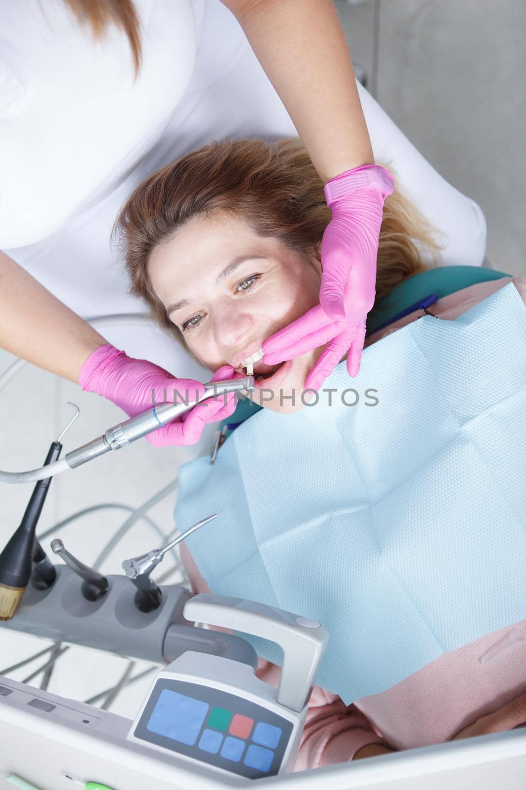 Top view shot of a mature female patient having professional dental cleaning procedure