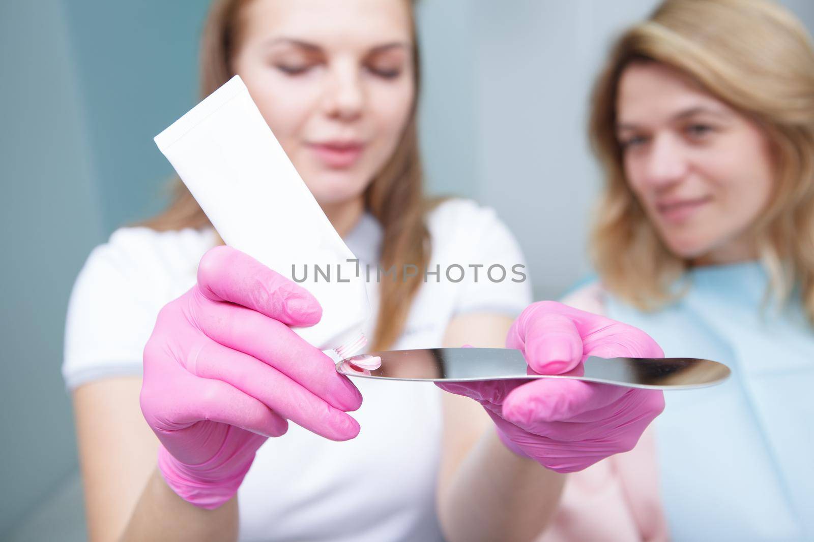 Mature woman at dental clinic by MAD_Production