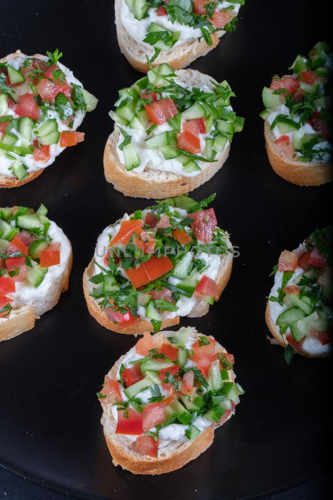 Bruschetta with tomatoes, mozzarella cheese and basil on a old rustic table. Traditional italian appetizer or snack, antipasto by senkaya