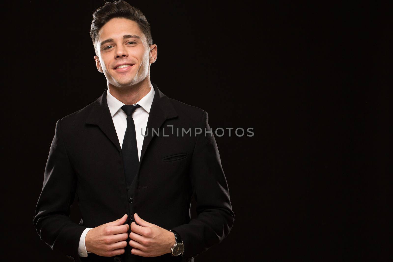 Elegant young man at studio by MAD_Production