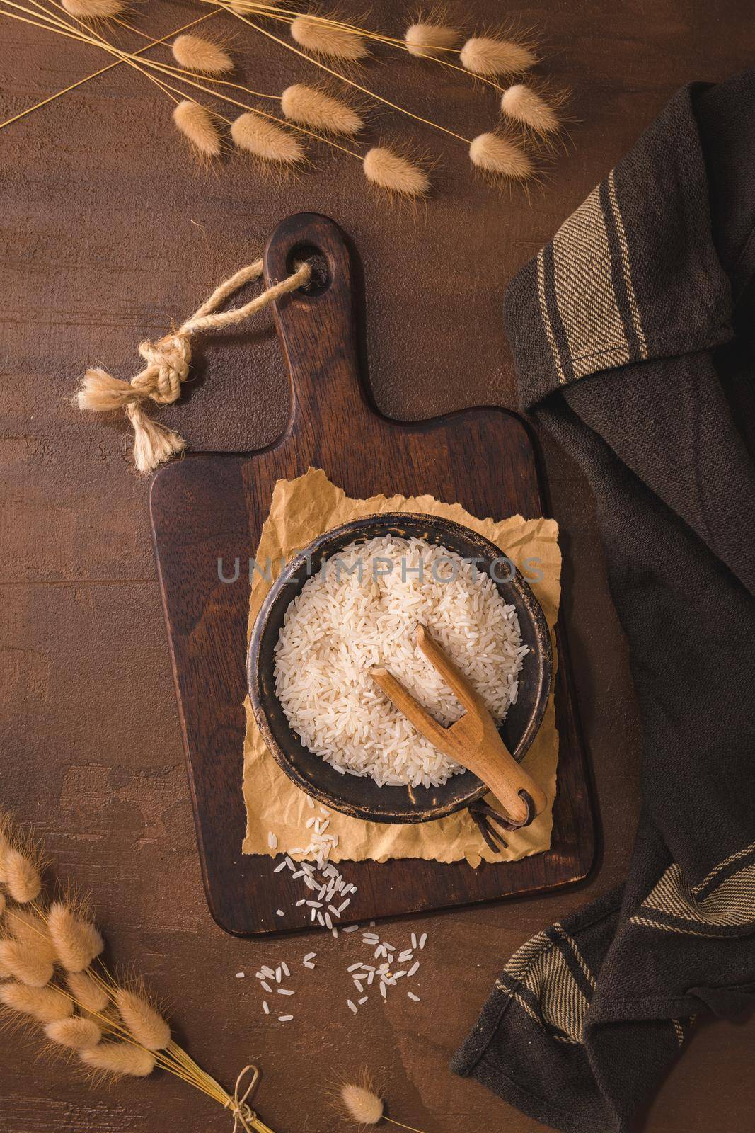 Basmati rice on rustic countertop by homydesign
