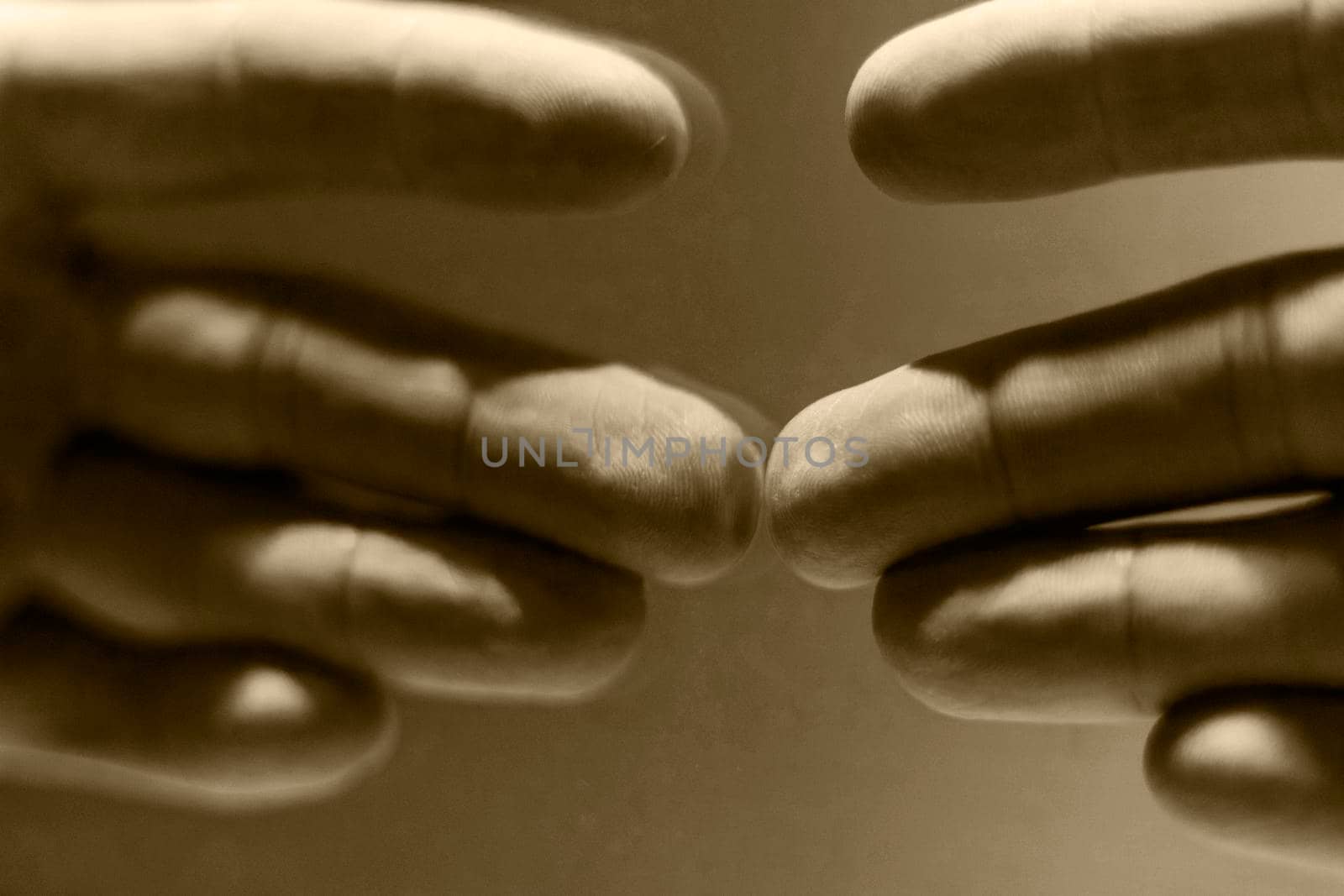 Close up shot of a hand's reflection in the mirror