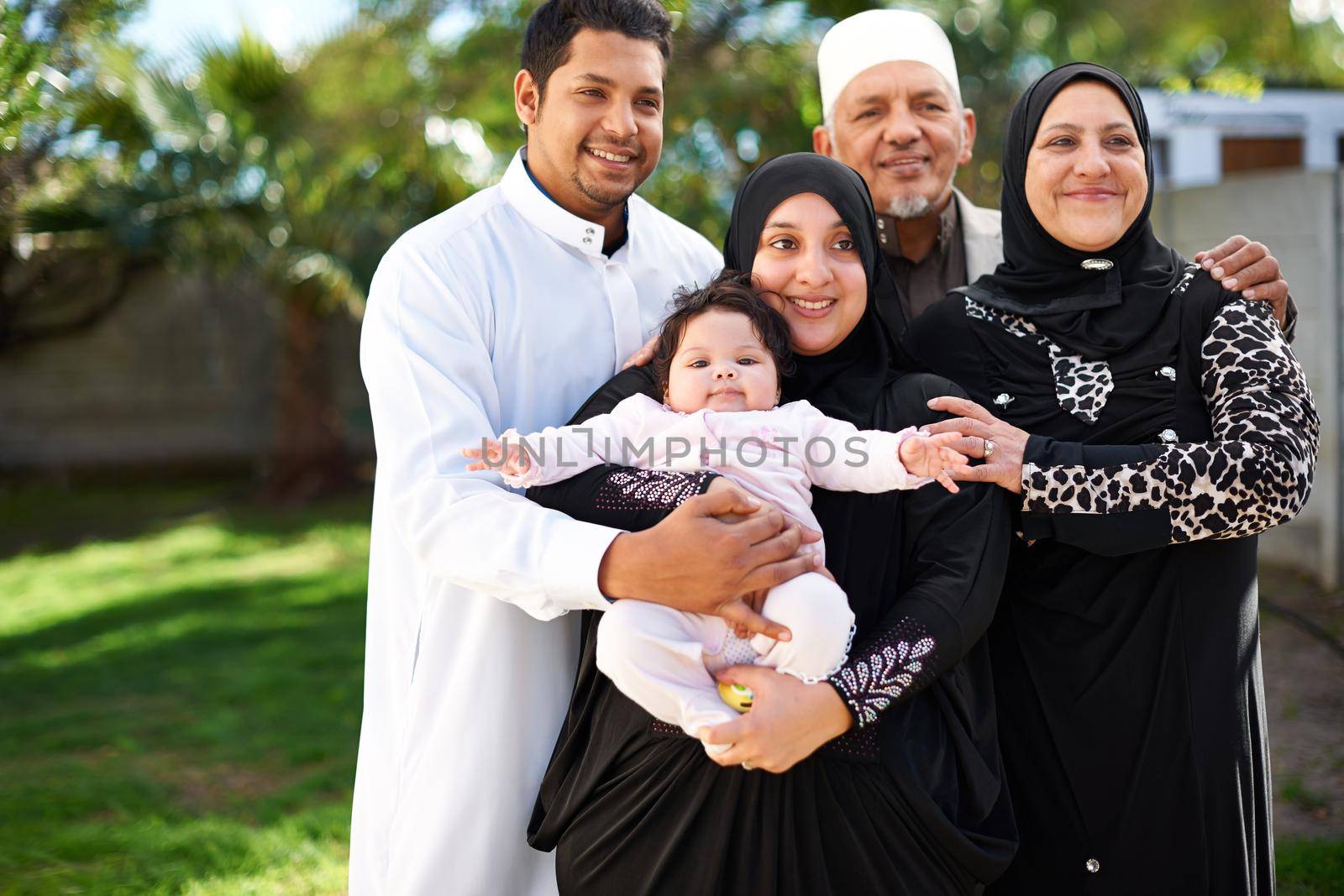 Three generations of love. A muslim family enjoying a day outside