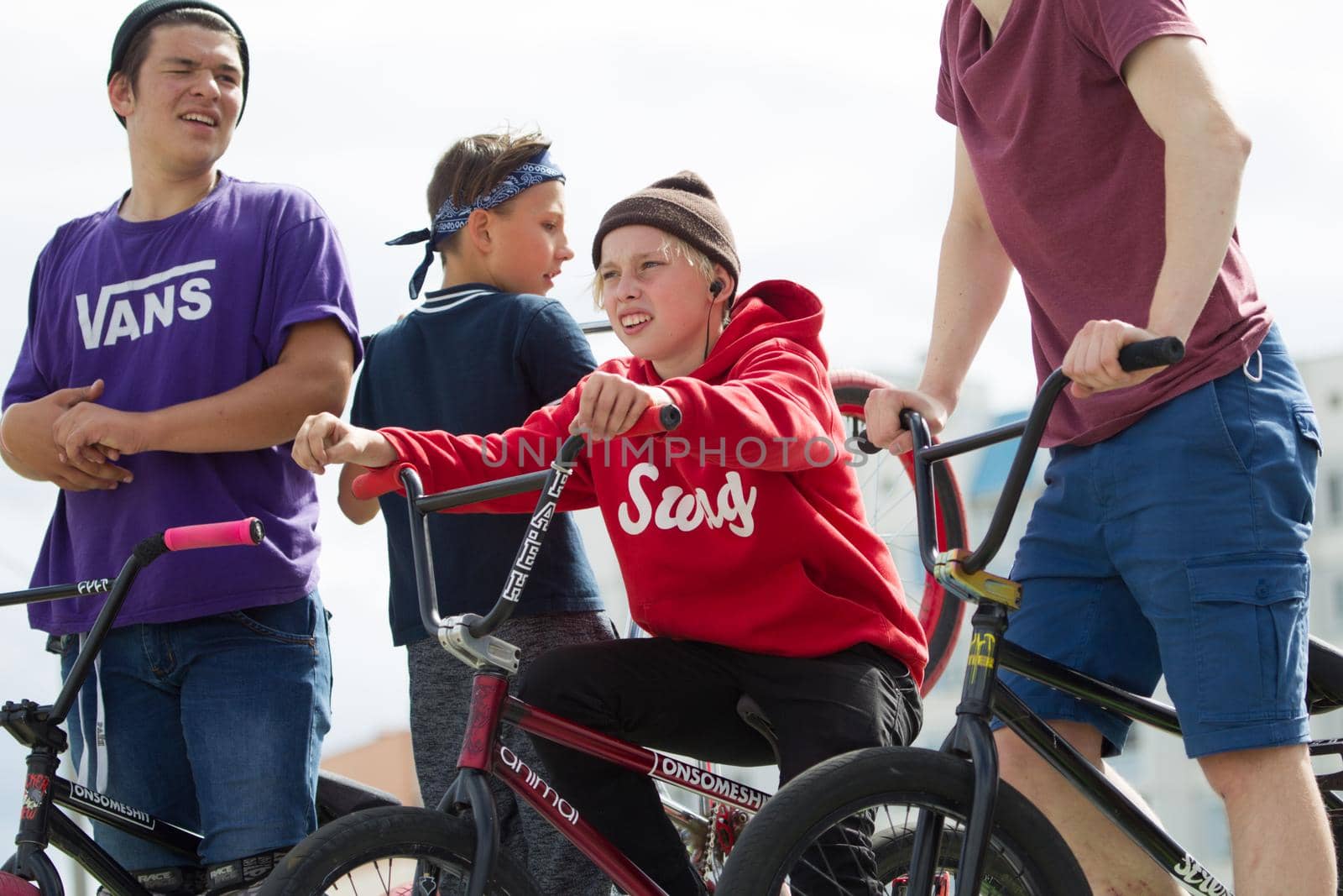 Teens on bicycles;