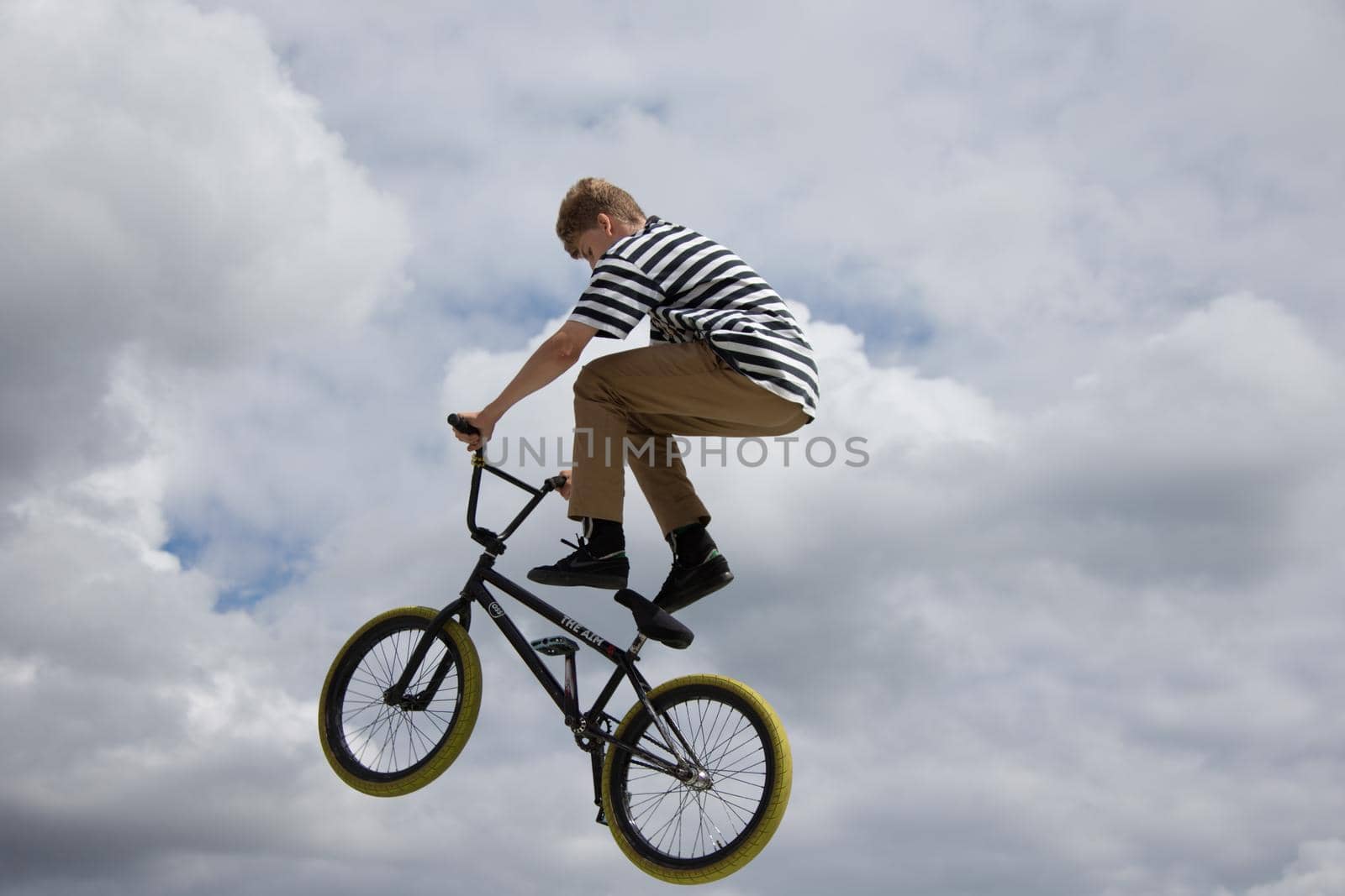 Extreme cycling.Risky sports cycling against the sky