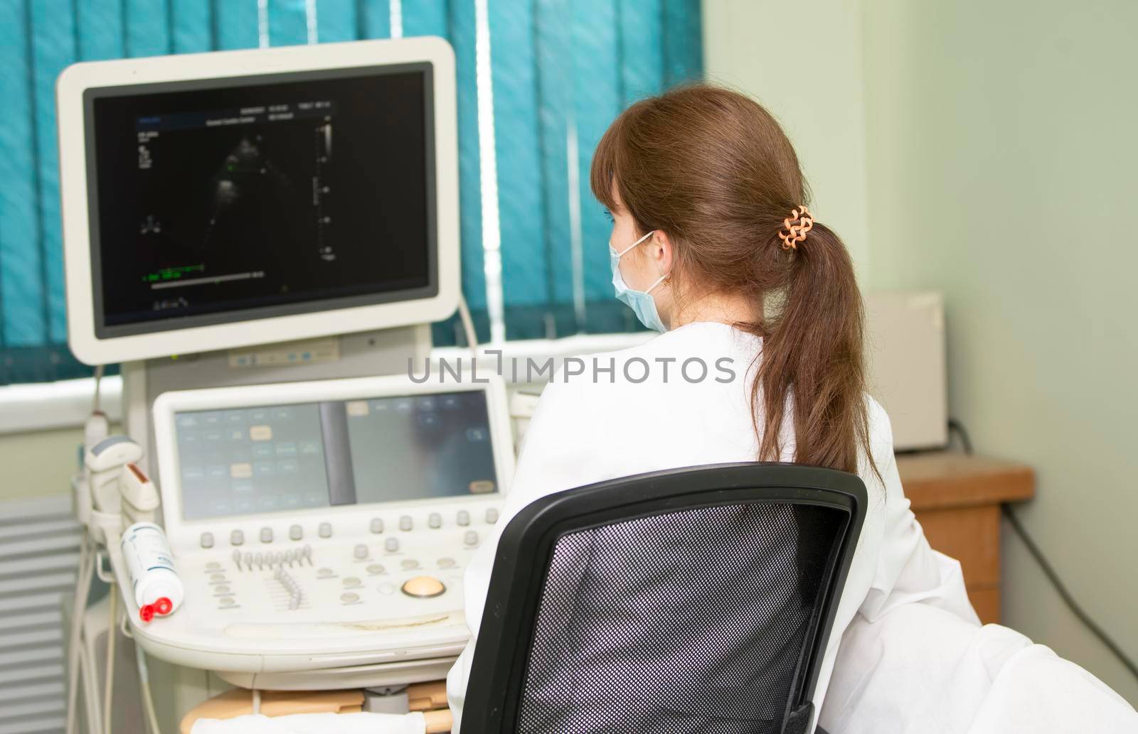 Belarus, Gomil city, Central hospital. May 31, 2021. The doctor makes an ultrasound examination.