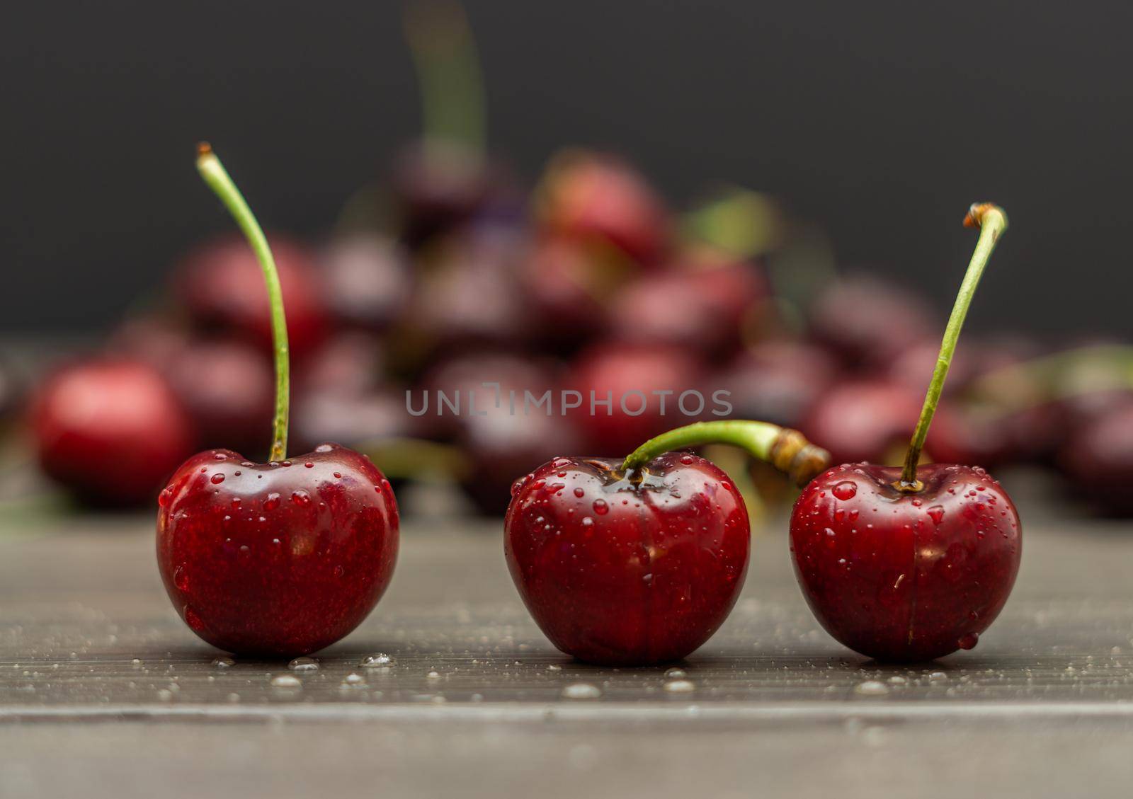 fresh red summer cherries with water drops