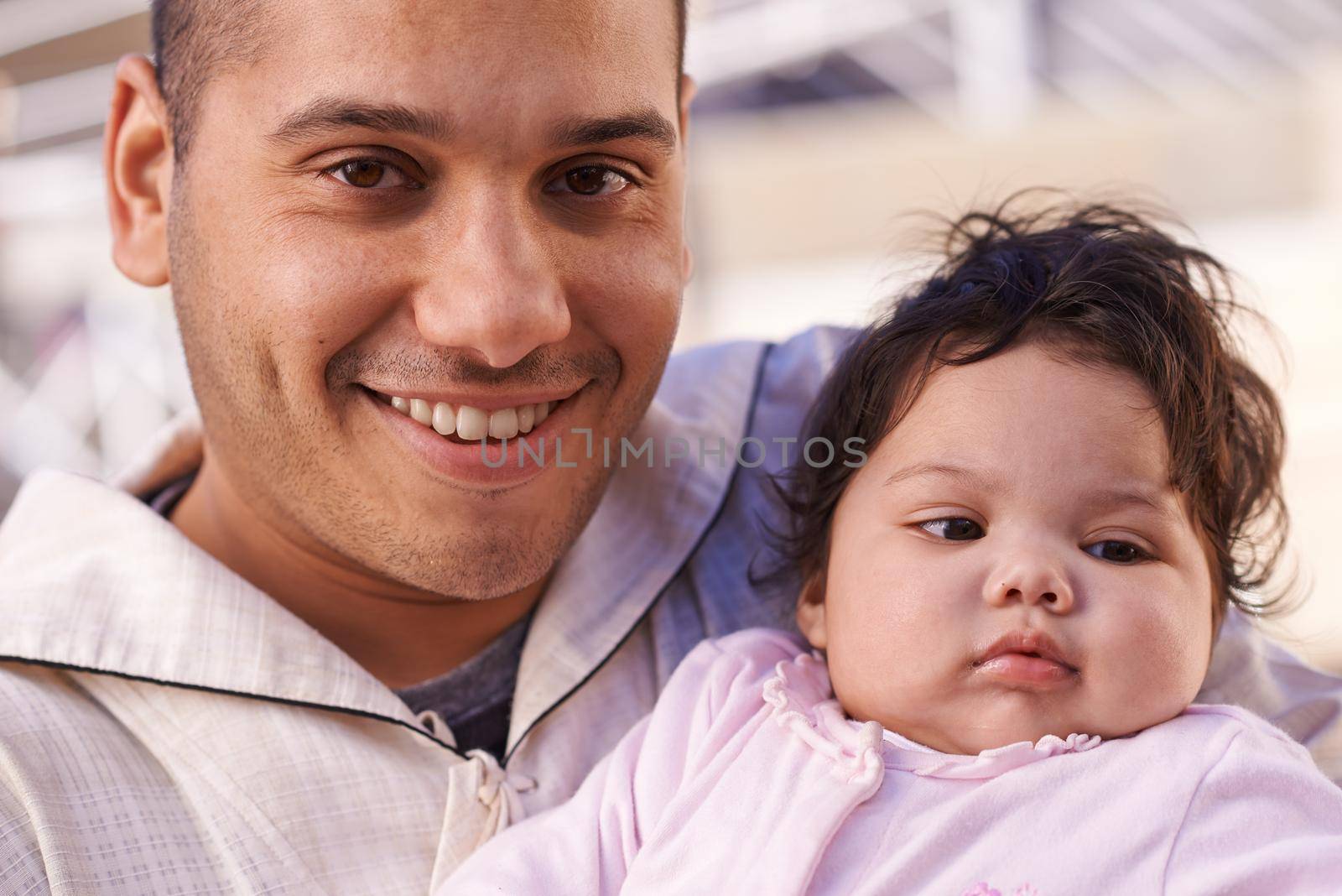 My little bundle of love and joy. a father cradling his little baby girl