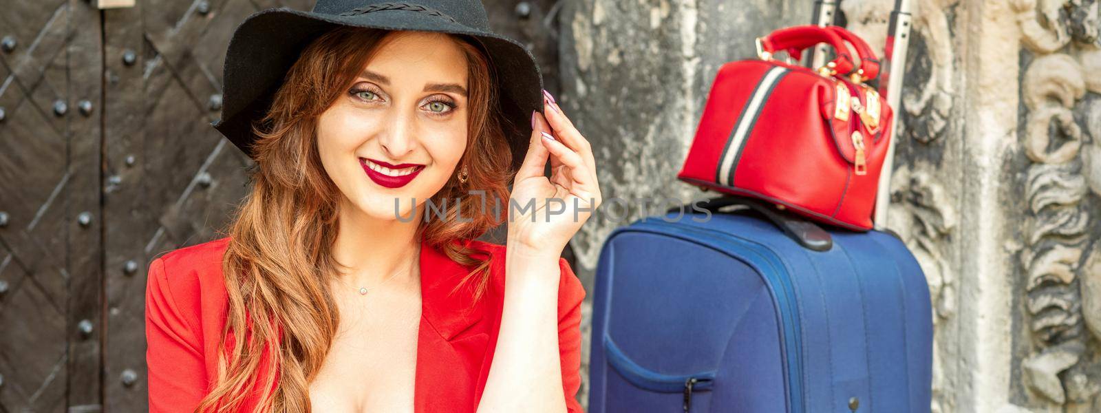 Woman sitting near ancient building by okskukuruza