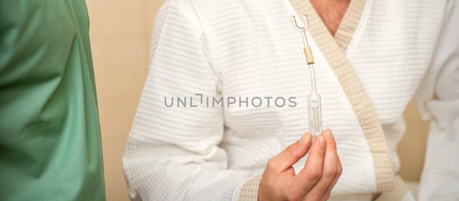 Young caucasian man receiving nasal inhalation Maholda with essential oil in the nose at a hospital