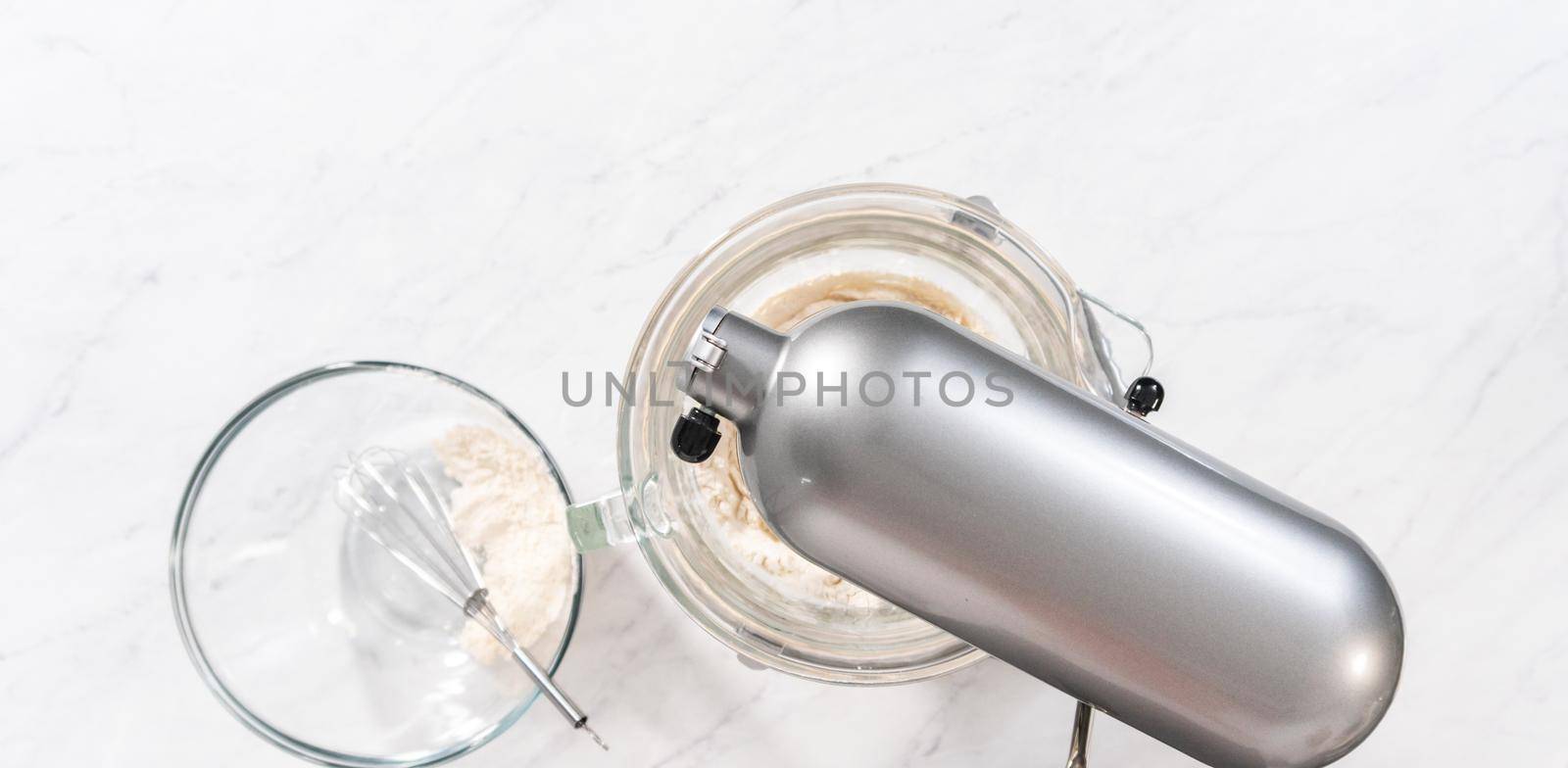 Flat lay. Mixing bread dough in a stand-alone kitchen mixer to bake patriotic cinnamon twists.