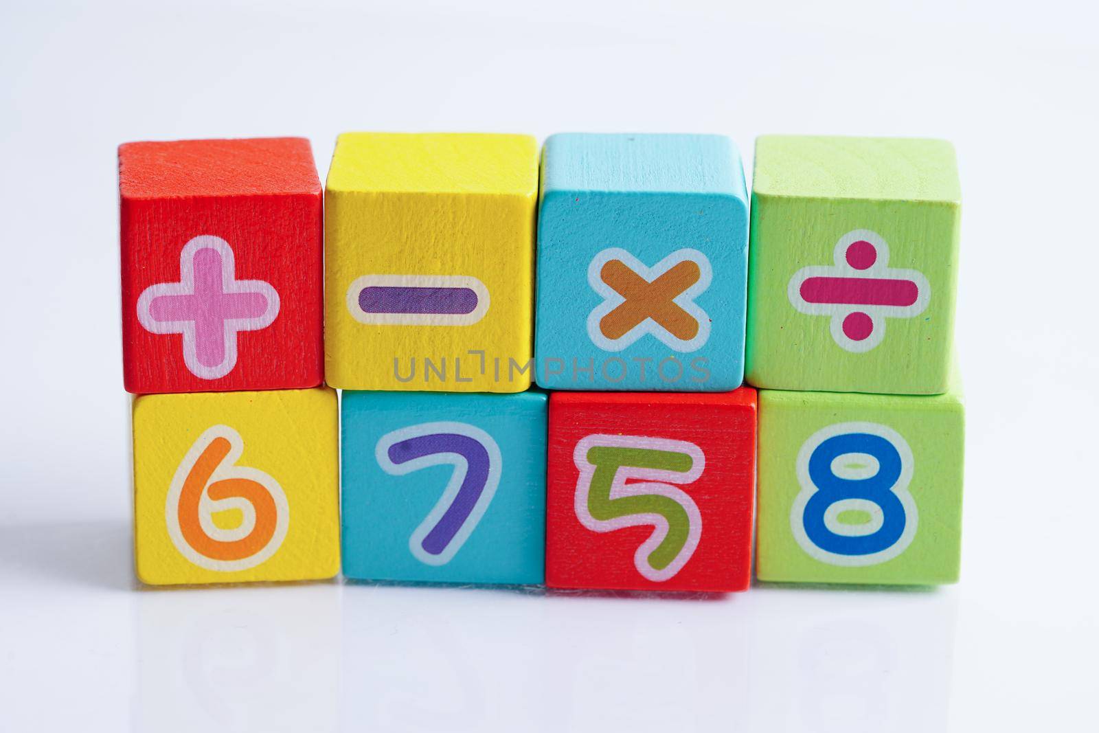 Number wood block cubes for learning Mathematic, education math concept.