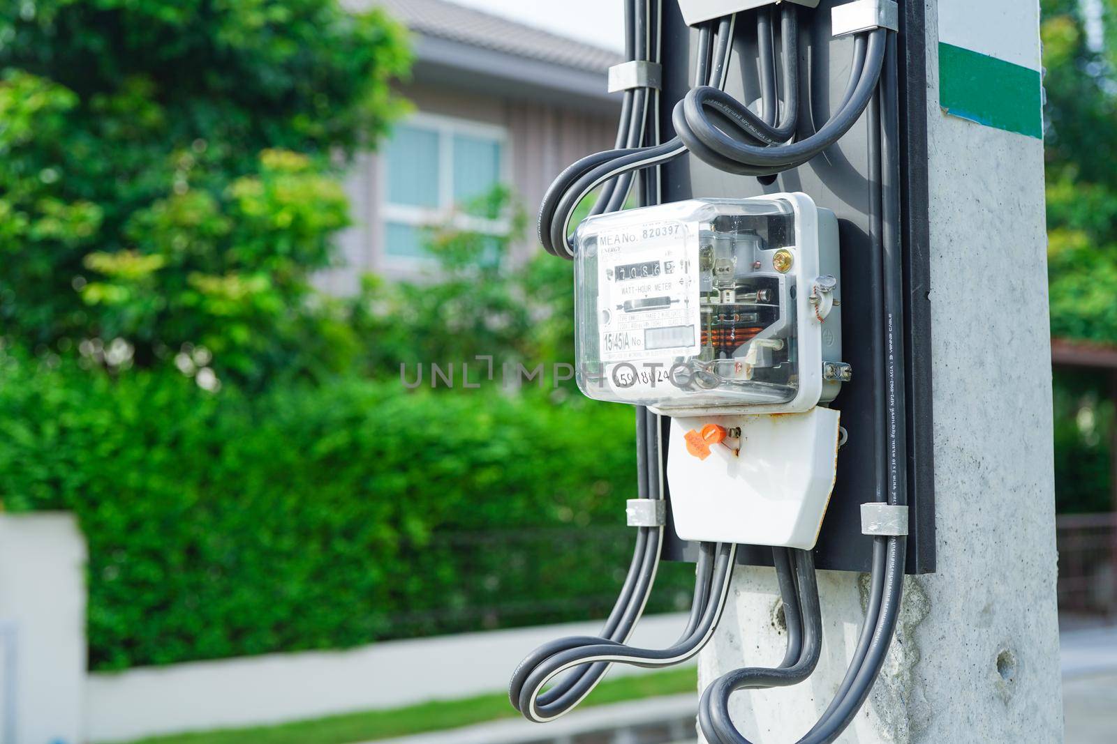 Bangkok, Thailand - May 15, 2022 Electric measuring power meter for energy cost at home and office.