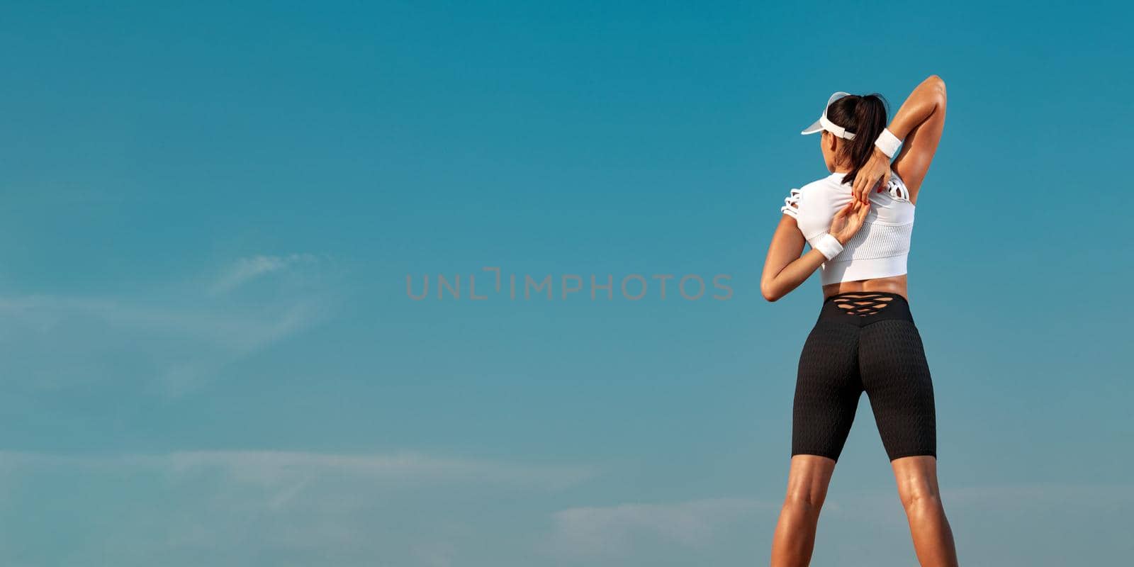 Banner picture for fitness website. Fit woman works on weight loss and fat burning outdoors.