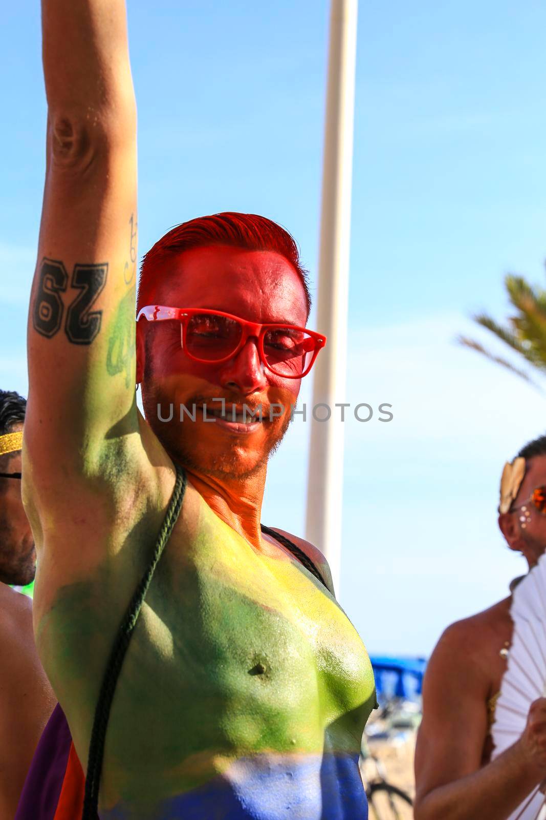 People dancing and having fun at the Gay Pride Parade in Benidorm by soniabonet